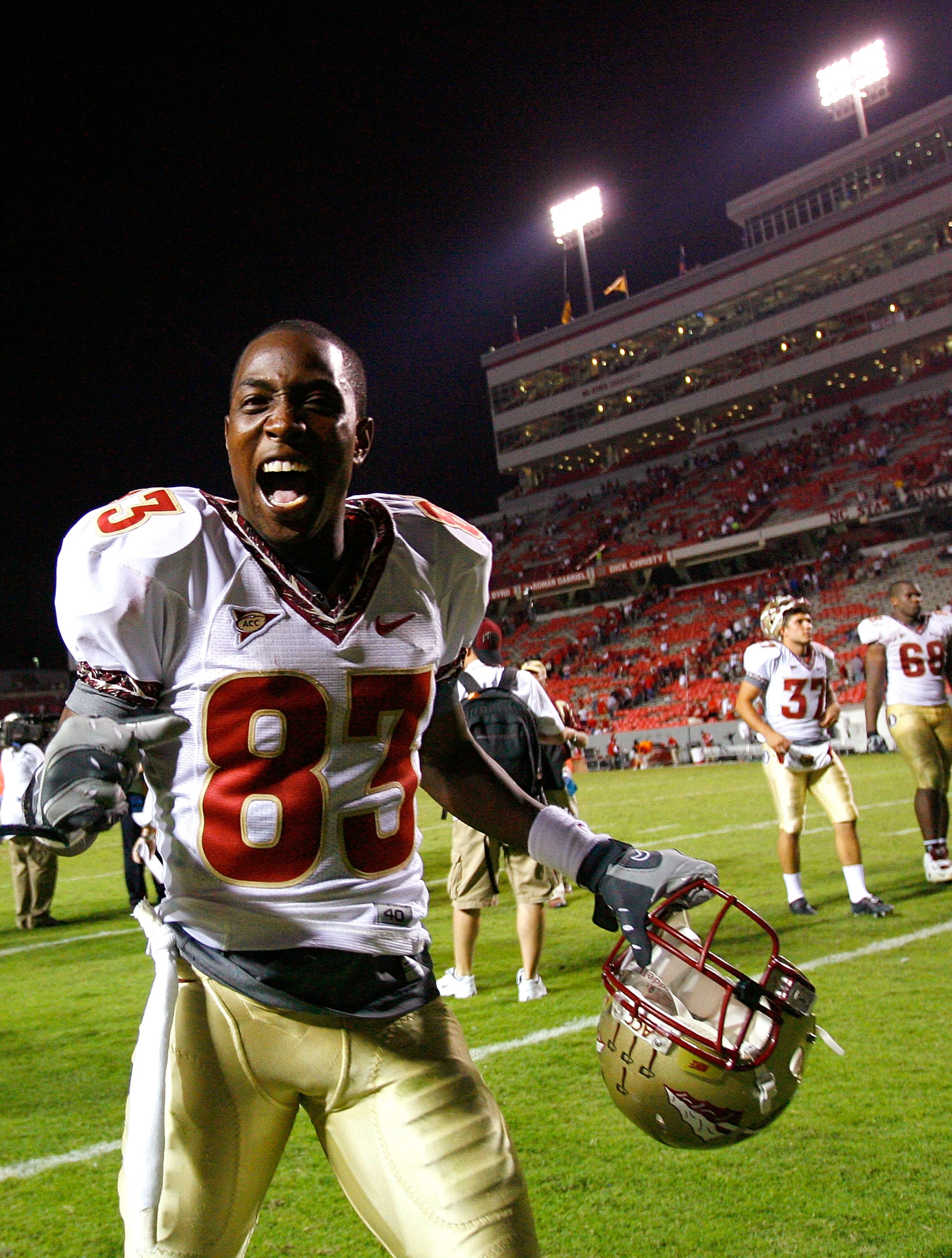 RALEIGH, NC - OCTOBER 16: Receiver Bert Reed #83 of the Florida State Seminoles celebrates after a 26-17 win over the North Carolina State Wolfpack at Carter-Finley Stadium on September 16, 2008 in Raleigh, North Carolina. (Photo by Kevin C. Cox/Getty I RALEIGH, NC - OCTOBER 16: Receiver Bert Reed #83 of the Florida State Seminoles celebrates after a 26-17 win over the North Carolina State Wolfpack at Carter-Finley Stadium on September 16, 2008 in Raleigh, North Carolina. (Photo by Kevin C. Cox/Getty I