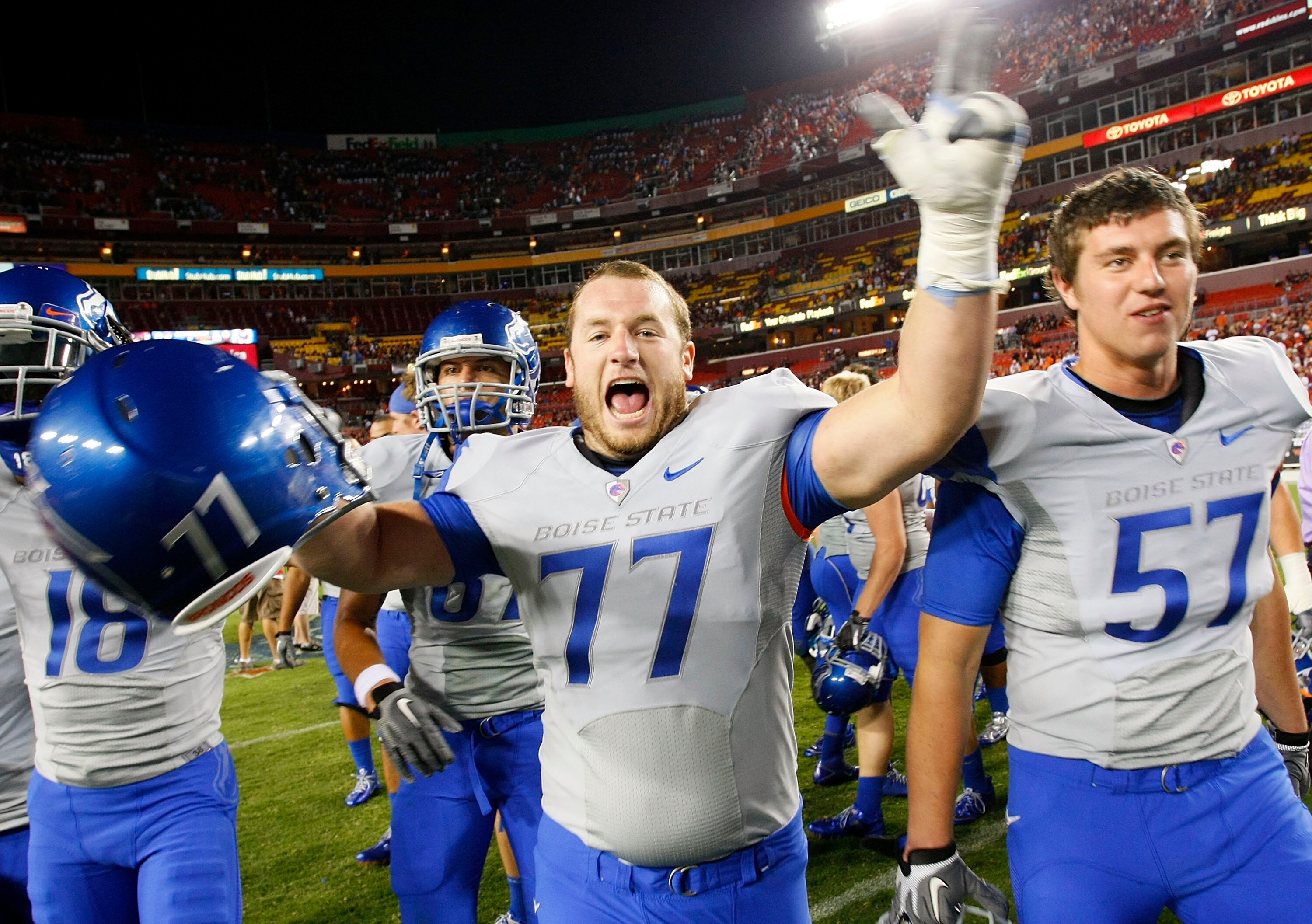LANDOVER, MD - SEPTEMBER 06:  Guard Spencer Gerke #77 of the Boise State Broncos celebrates after the Broncos defeated the Virginia Tech Hokies 33-30  at FedExField on September 6, 2010 in Landover, Maryland.  (Photo by Geoff Burke/Getty Images)