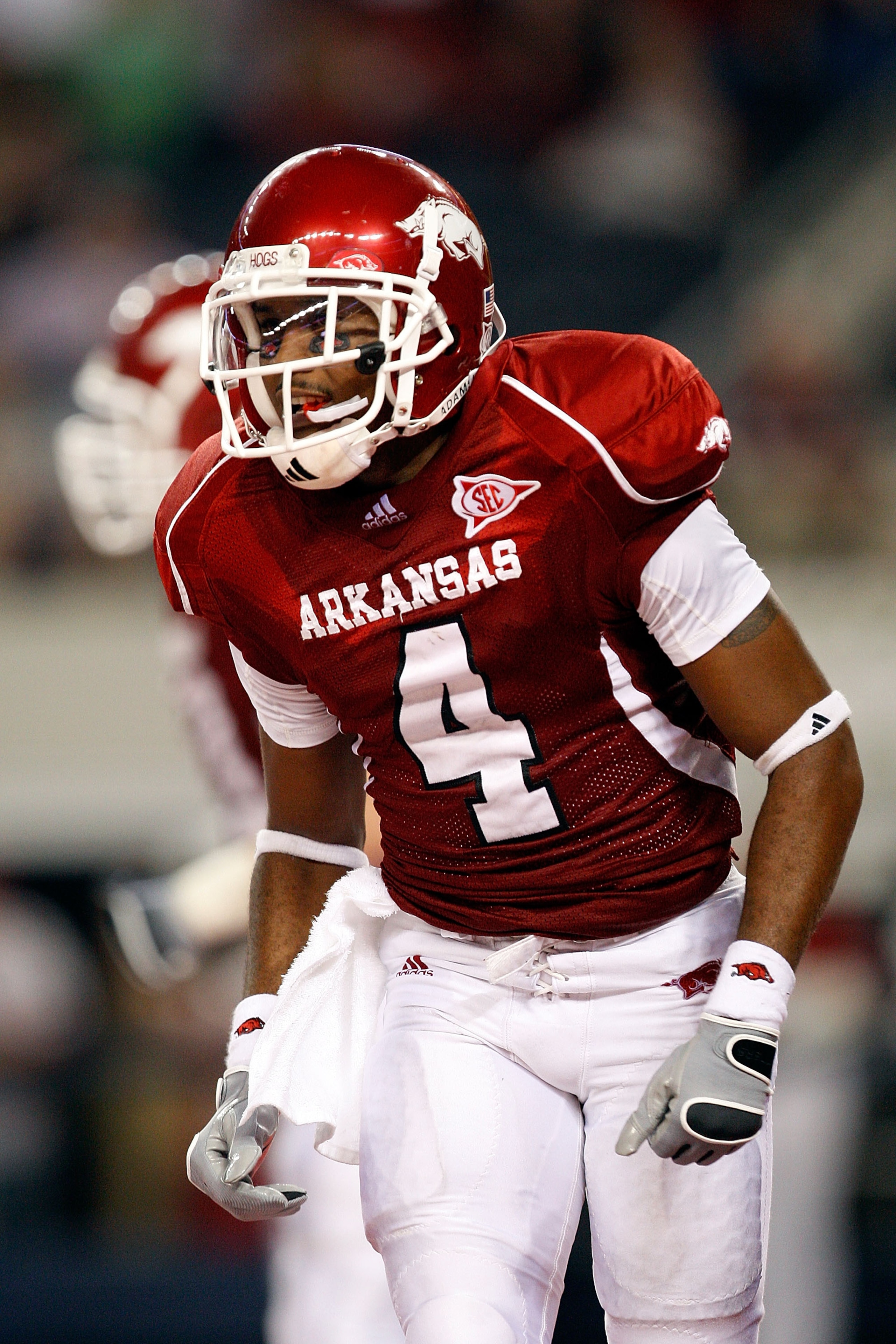 ARLINGTON, TX - OCTOBER 03:  Wide receiver Jarius Wright #4 of the Arkansas Razorbacks celebrates a touchdown pass reception against the Texas A&M Aggies at Dallas Cowboys Stadium on October 3, 2009 in Arlington, Texas.  (Photo by Ronald Martinez/Getty Im