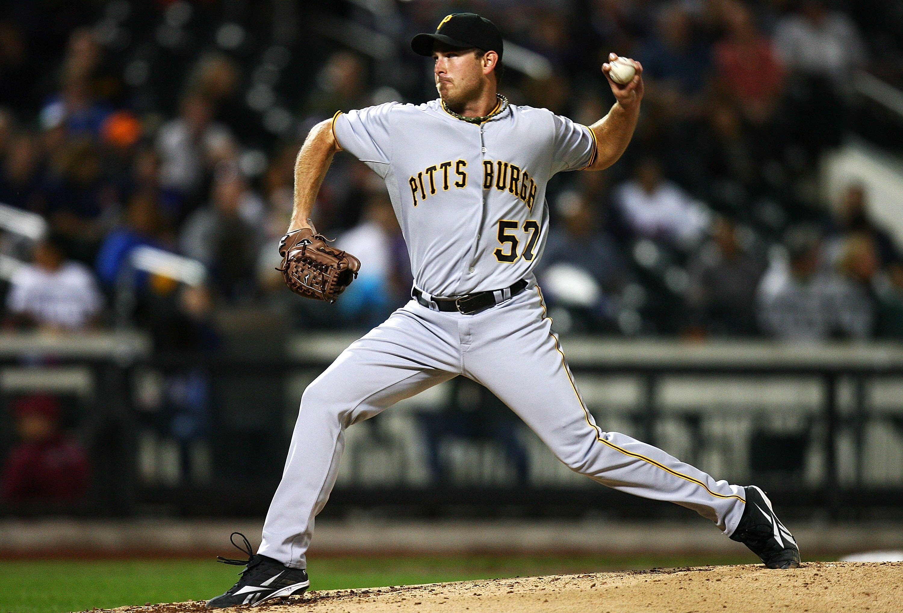 NEW YORK - SEPTEMBER 14:  Zach Duke #57 of the Pittsburgh Pirates pitches against the New York Mets on September 14, 2010 at Citi Field in the Flushing neighborhood of the Queens borough of New York City.  (Photo by Andrew Burton/Getty Images)