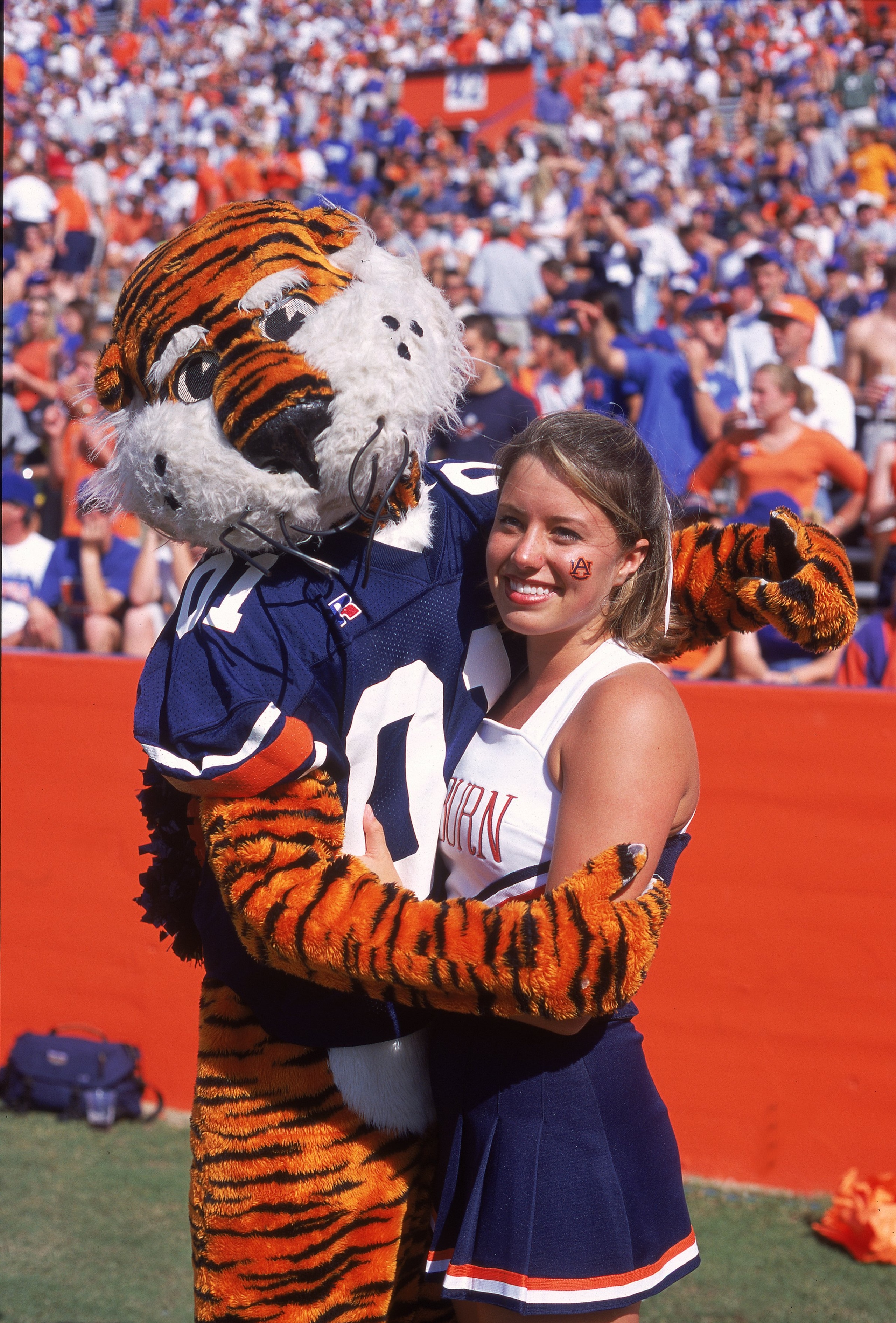 14 Oct 2000:  A general view of the Auburn Tigers mascot holding one of the team's cheerleaders during the game against the Florida Gators at the Ben Hill Griffin Stadium in Gainsville, Florida. The Gators defeated the Tigers 28-7.Mandatory Credit: Scott