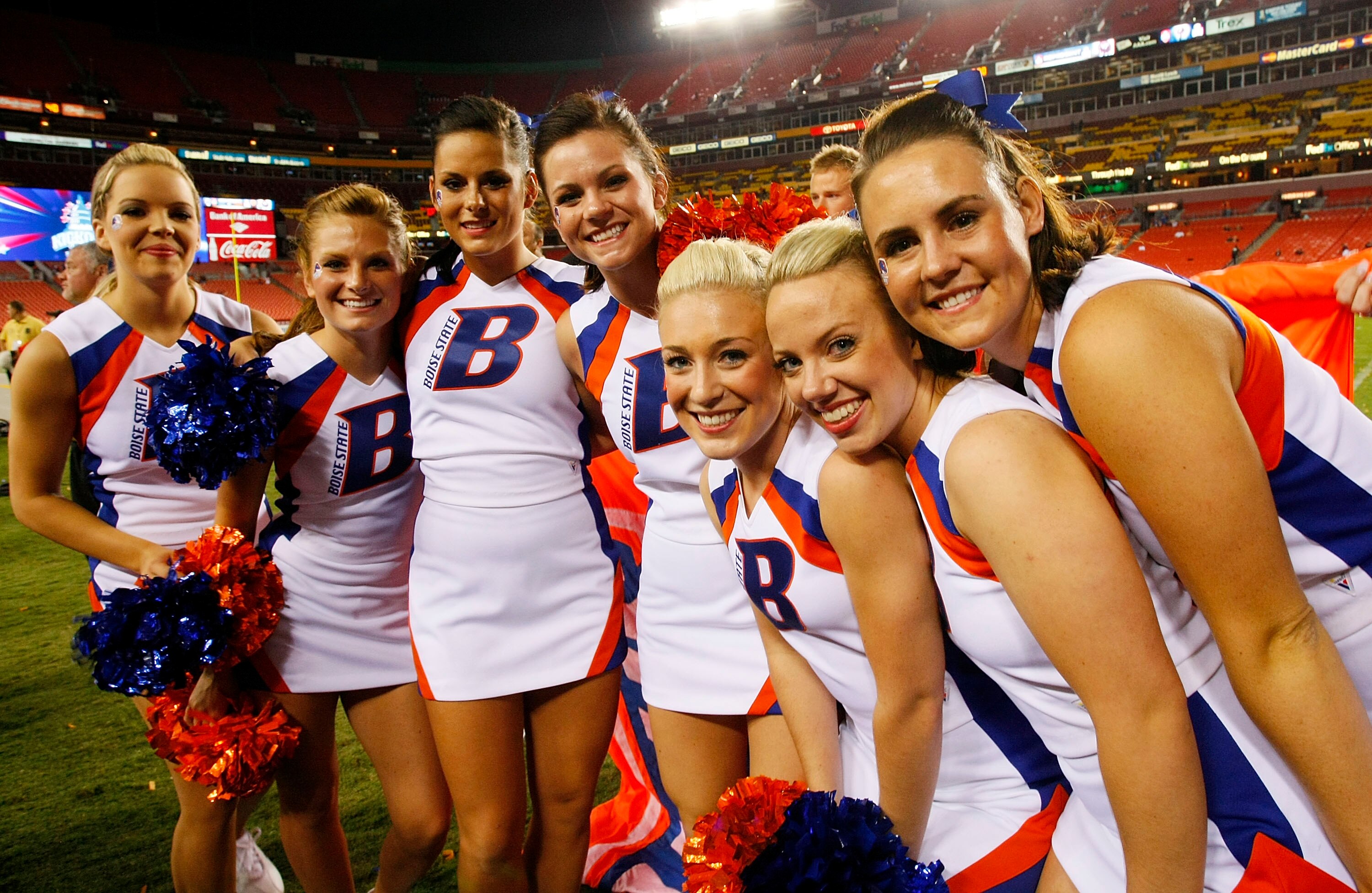 LANDOVER, MD - SEPTEMBER 06:  Boise State Broncos cheerleaders pose on the sidelines after the Broncos defeated the Virginia Tech Hokies 33-30 at FedExField on September 6, 2010 in Landover, Maryland.  (Photo by Geoff Burke/Getty Images)