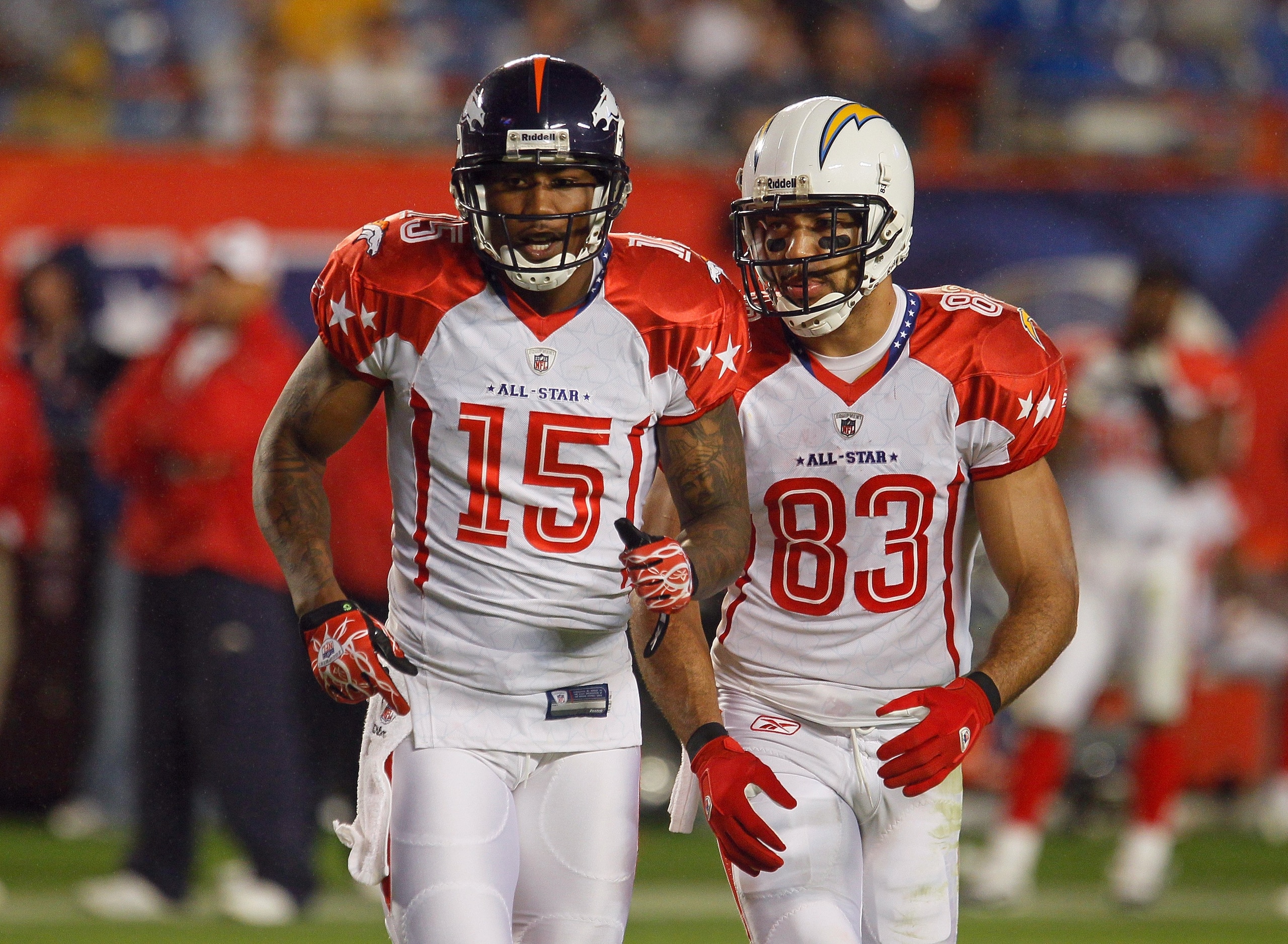 MIAMI GARDENS, FL - JANUARY 31:  Brandon Marshall #15 and Vincent Jackson #83 of the AFC's Denver Broncos and San Diego Chargers jog on the field during the 2010 AFC-NFC Pro Bowl game at Sun Life Stadium on January 31, 2010 in Miami Gardens, Florida. The 