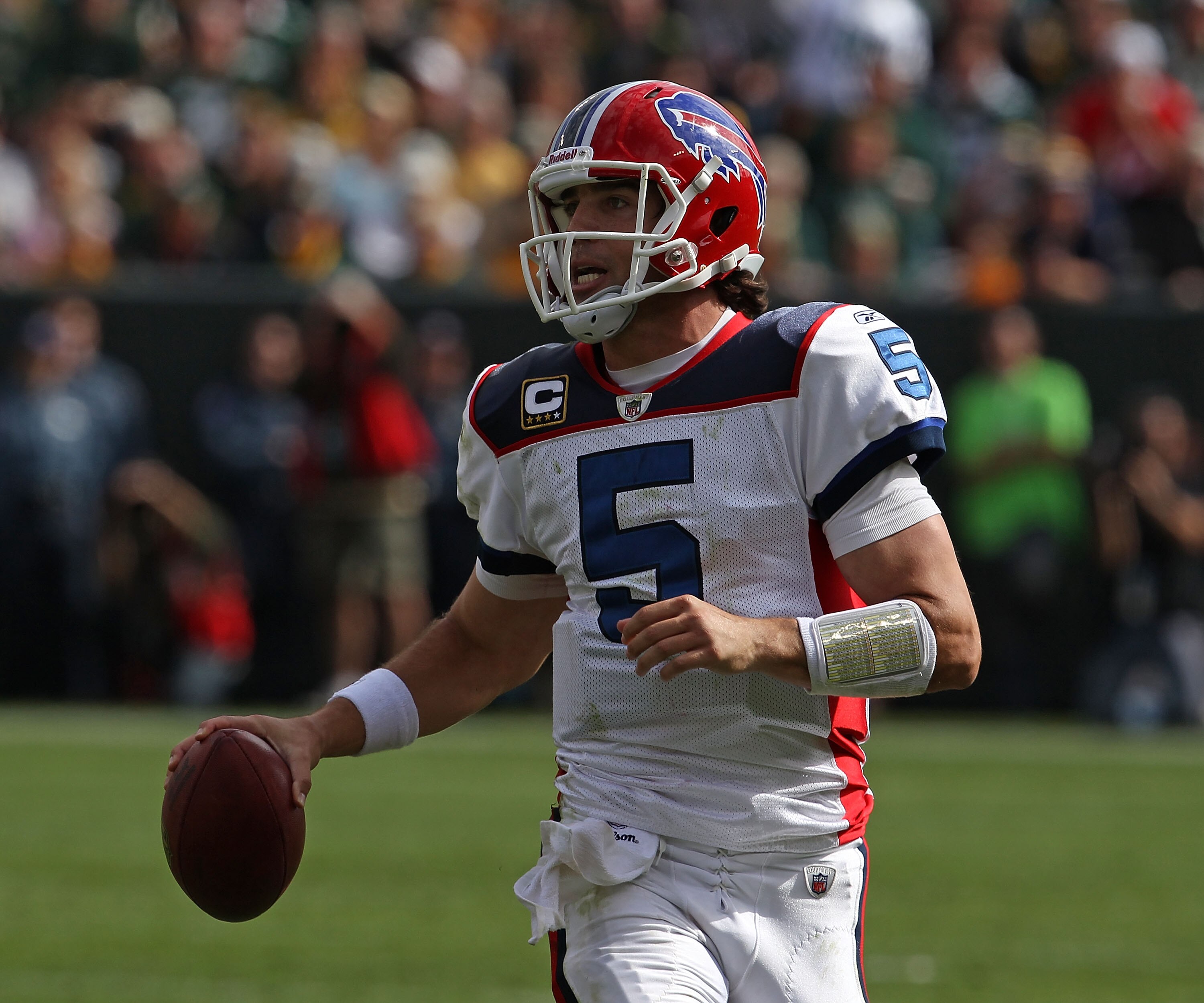 GREEN BAY, WI - SEPTEMBER 19: Trent Edwards #5 of the Buffalo Bills rolls out to look for a receiver against the Green Bay Packers at Lambeau Field on September 19, 2010 in Green Bay, Wisconsin. The Packers defeated the Bills 34-7. (Photo by Jonathan Dani