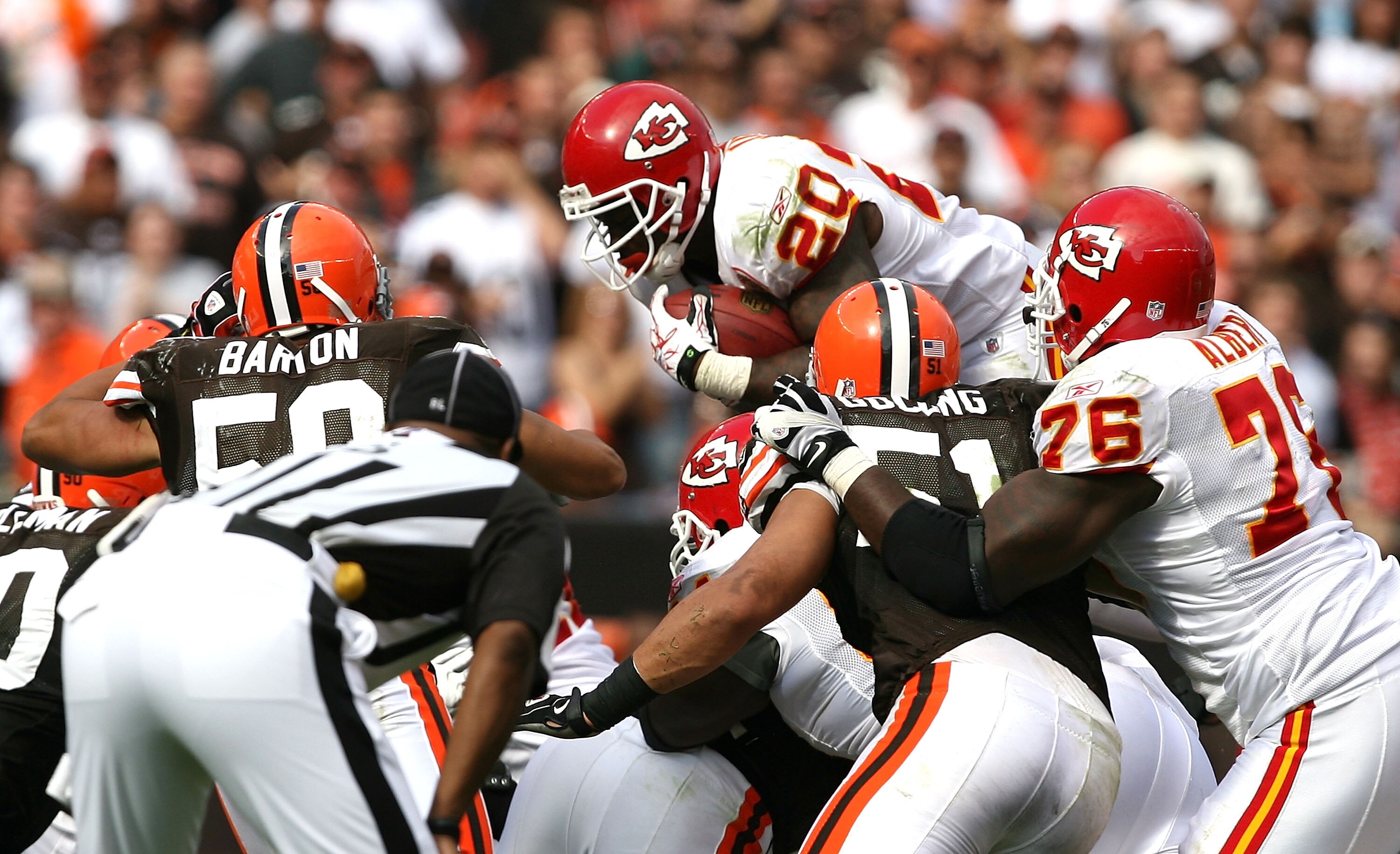 CLEVELAND - SEPTEMBER 19:  Running back Thomas Jones #20 of the Kansas City Chiefs dives for a first down against the Cleveland Browns at Cleveland Browns Stadium on September 19, 2010 in Cleveland, Ohio.  (Photo by Matt Sullivan/Getty Images)