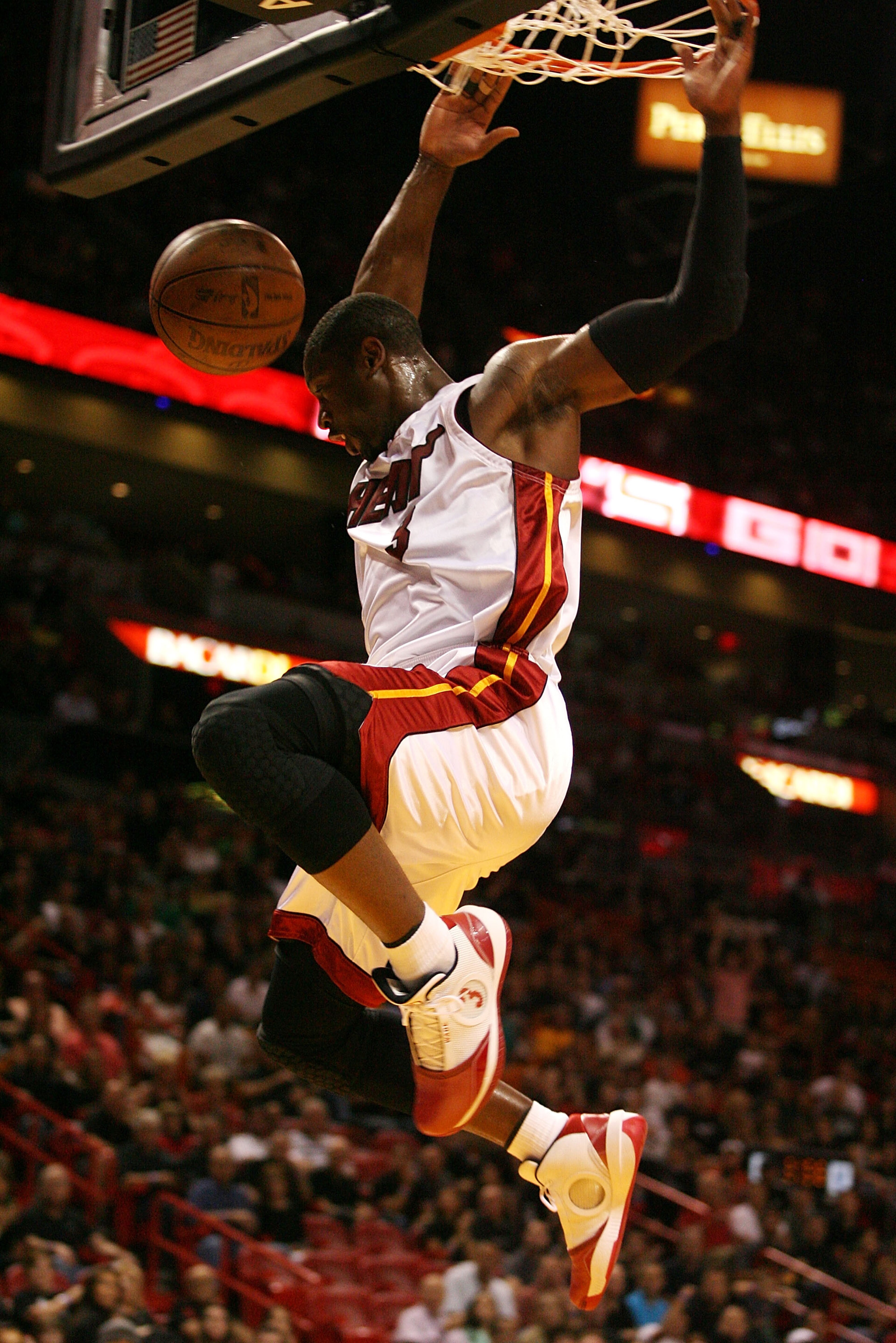 MIAMI - APRIL 25: Guard Dwyane Wade #3 of the Miami Heat dunks against the Boston Celtics in Game Four of the Eastern Conference Quarterfinals during the 2010 NBA Playoffs at American Airlines Arena on April 25, 2010 in Miami, Florida. NOTE TO USER: Use MIAMI - APRIL 25: Guard Dwyane Wade #3 of the Miami Heat dunks against the Boston Celtics in Game Four of the Eastern Conference Quarterfinals during the 2010 NBA Playoffs at American Airlines Arena on April 25, 2010 in Miami, Florida. NOTE TO USER: Use