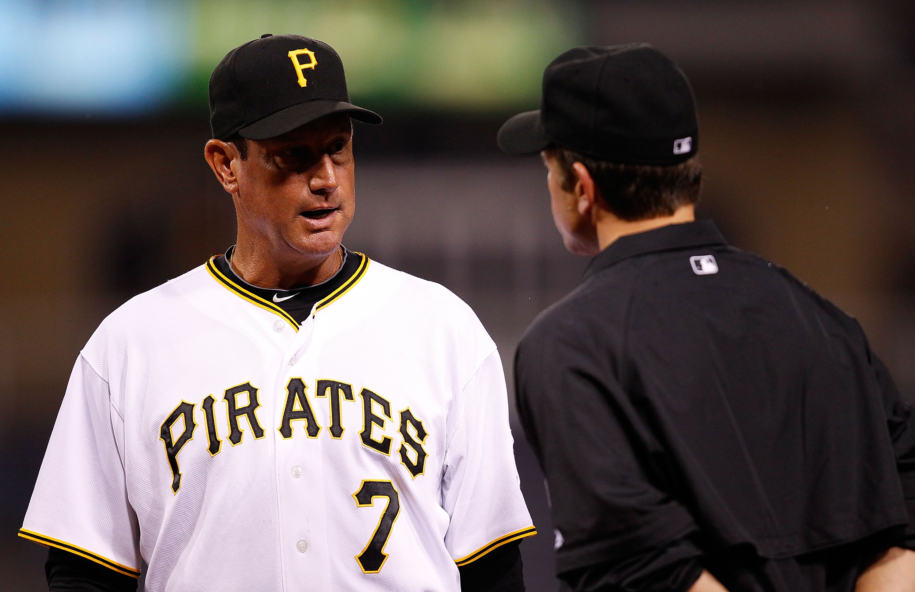 PITTSBURGH - AUGUST 25:  Manager John Russell #7 of the Pittsburgh Pirates argues a home run call with umpire Chris Guccione during the game against the St. Louis Cardinals on August 25, 2010 at PNC Park in Pittsburgh, Pennsylvania.  (Photo by Jared Wicke