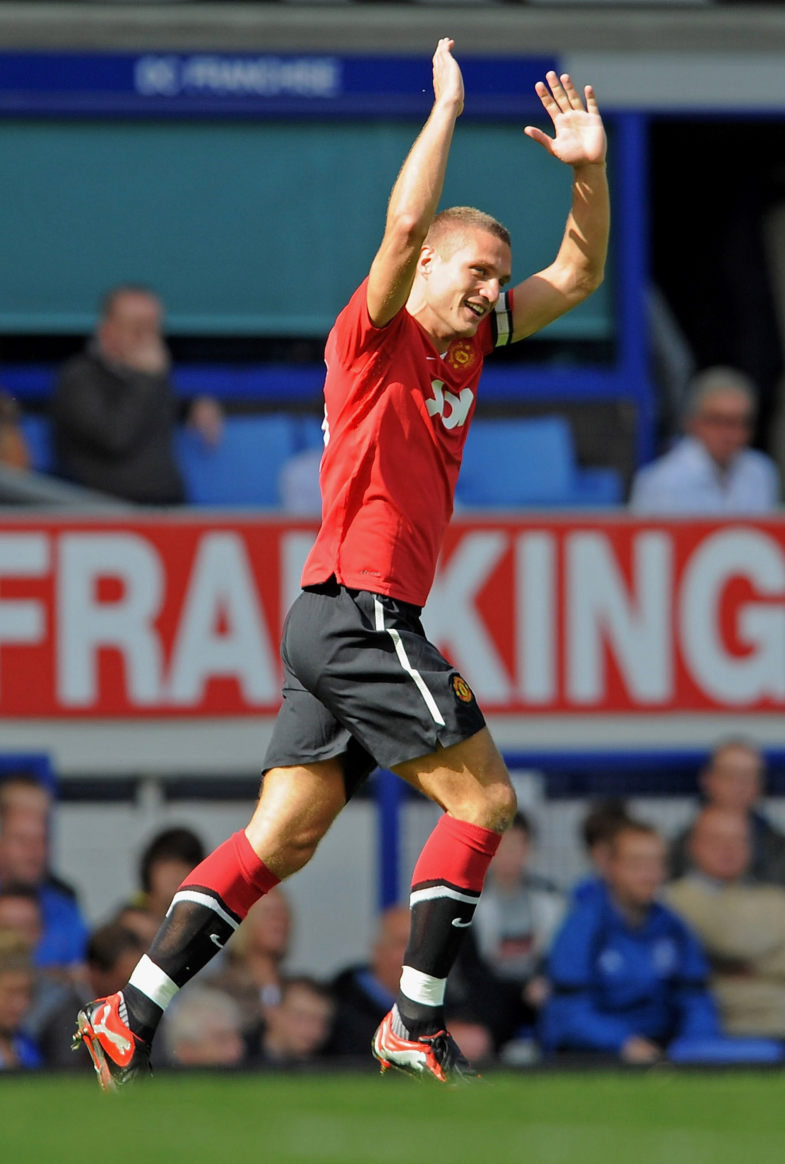 LIVERPOOL, ENGLAND - SEPTEMBER 11: Nemanja Vidic of Manchester United celebrates his goal to make it 2-1 during the Barclays Premier League match between Everton and Manchester United at Goodison Park on September 11, 2010 in Liverpool, England.  (Photo b