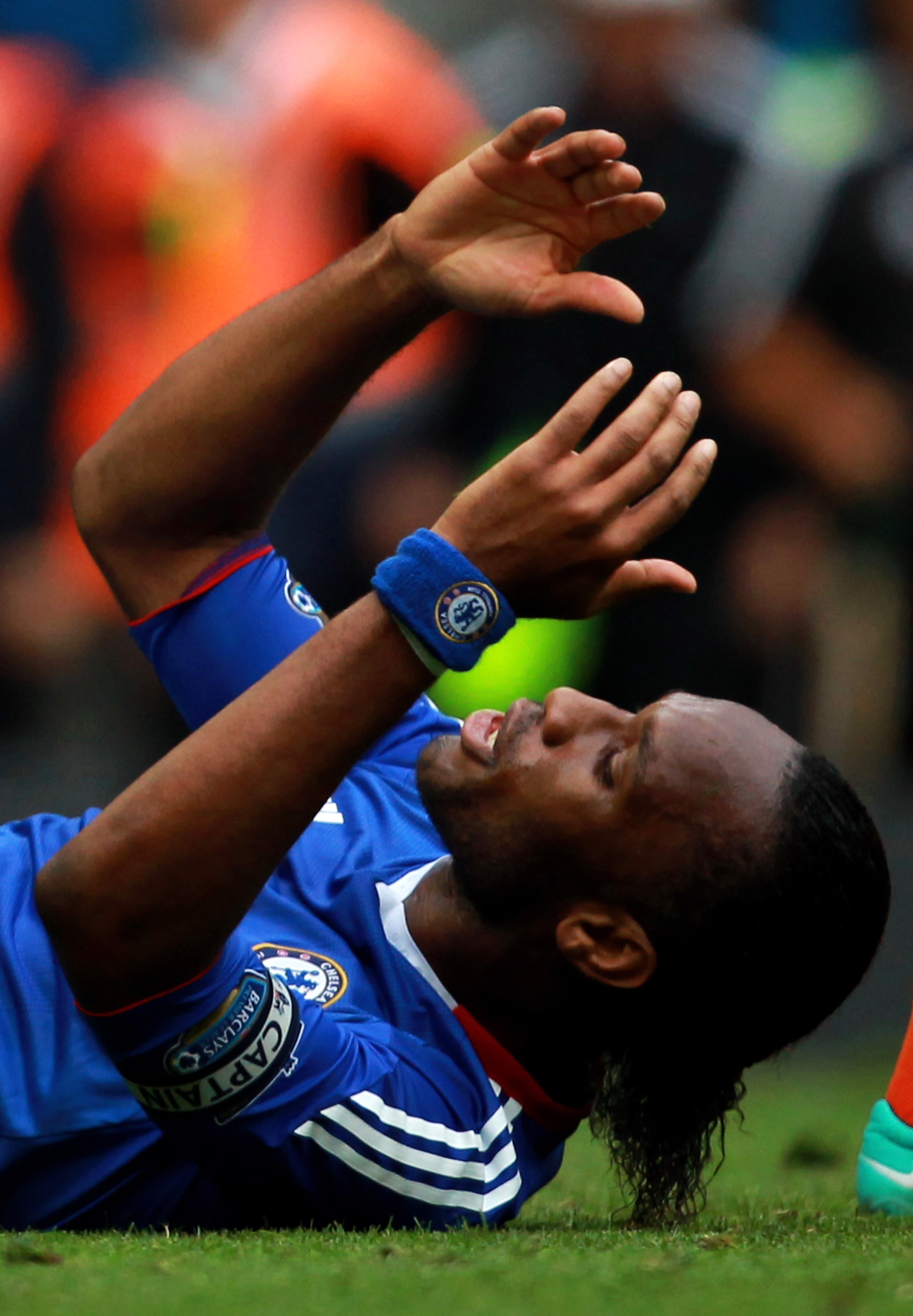 LONDON, ENGLAND - SEPTEMBER 19:  Didier Drogba of Chelsea reacts after a missed chance on goal during the Barclays Premier League match between Chelsea and Blackpool at Stamford Bridge on September 19, 2010 in London, England.  (Photo by Warren Little/Get