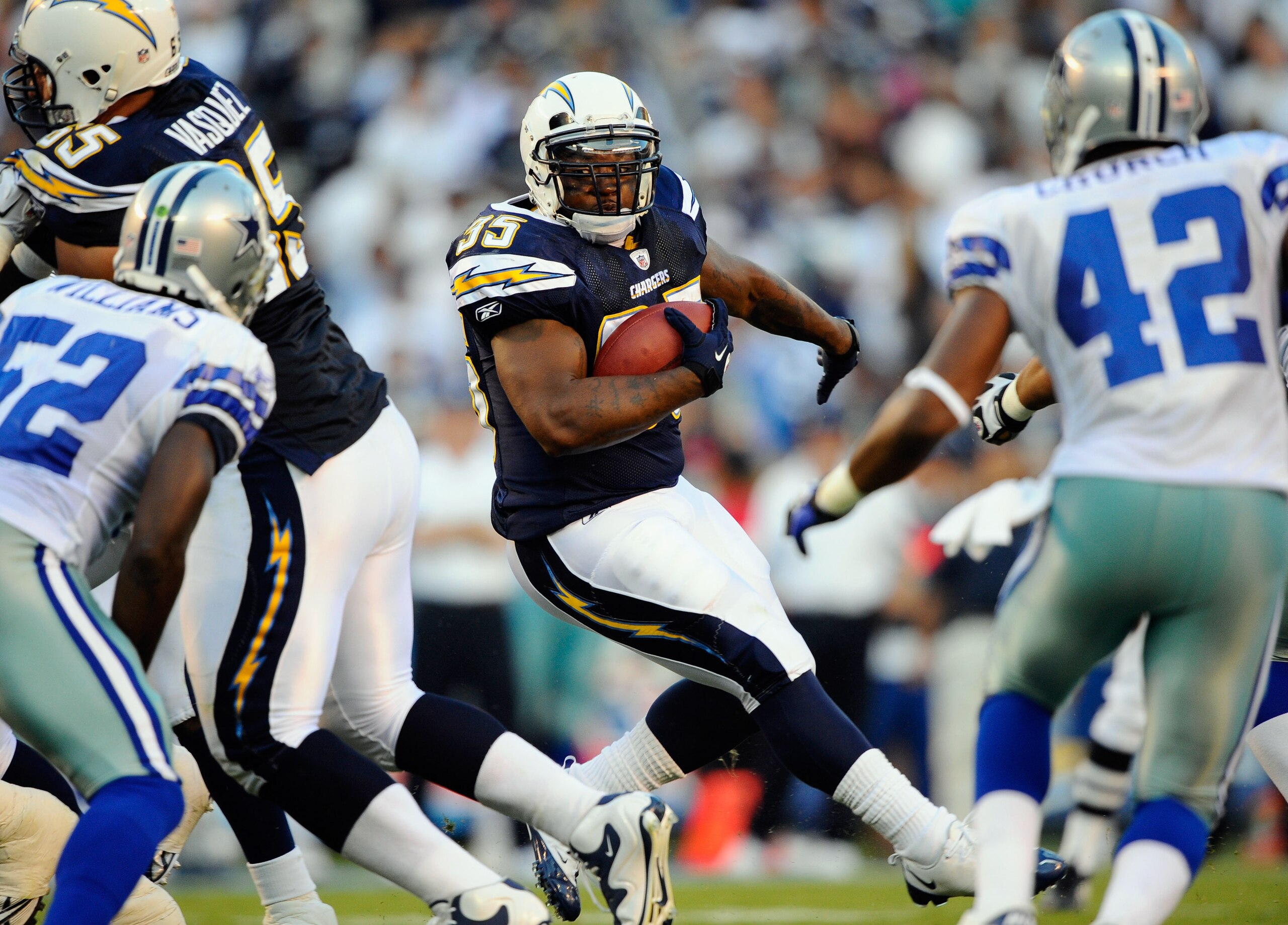 SAN DIEGO - AUGUST 21:  Full back Mike Tolbert #35 of the San Diego Chargers rushes during the pre-season NFL football game against Dallas Cowboys at Qualcomm Stadium on August 21, 2010 in San Diego, California.  (Photo by Kevork Djansezian/Getty Images)