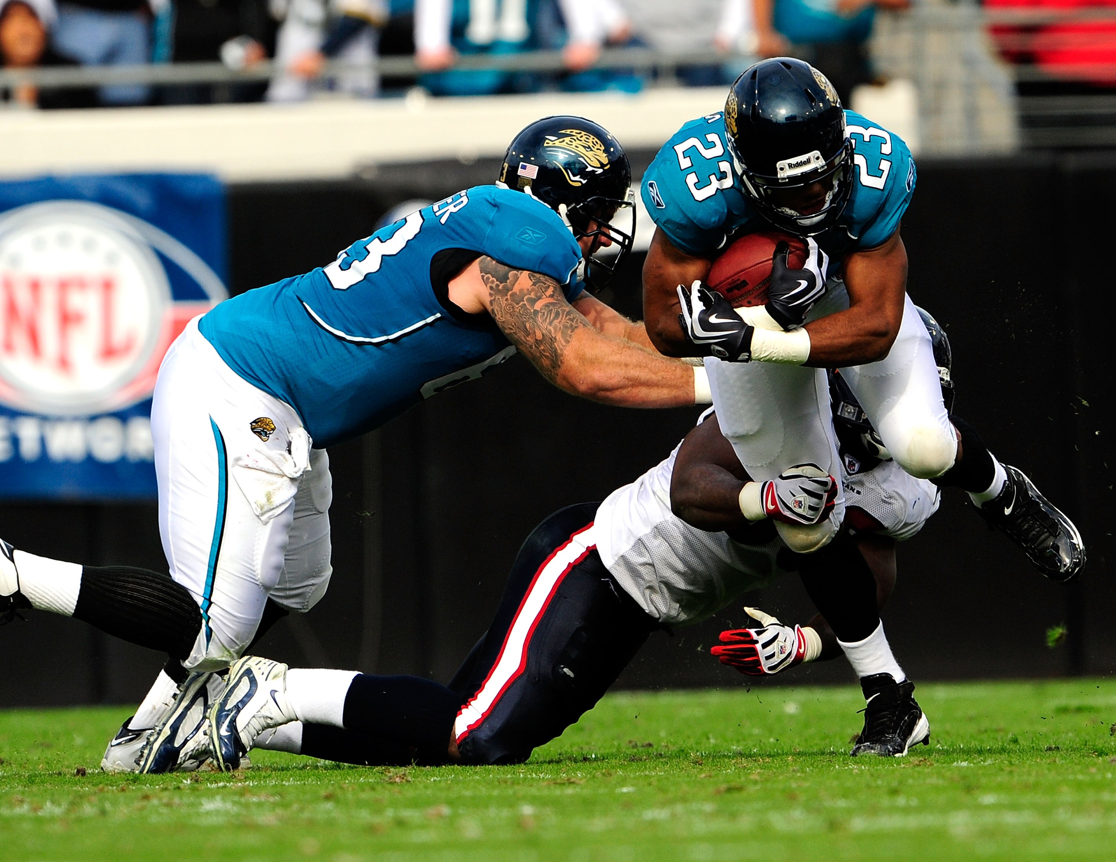 JACKSONVILLE, FL - DECEMBER 06:  Rashad Jennings #23 of the Jacksonville Jaguars runs for yardage during the game against the Houston Texans at Jacksonville Municipal Stadium on December 6, 2009 in Jacksonville, Florida.  (Photo by Sam Greenwood/Getty Ima