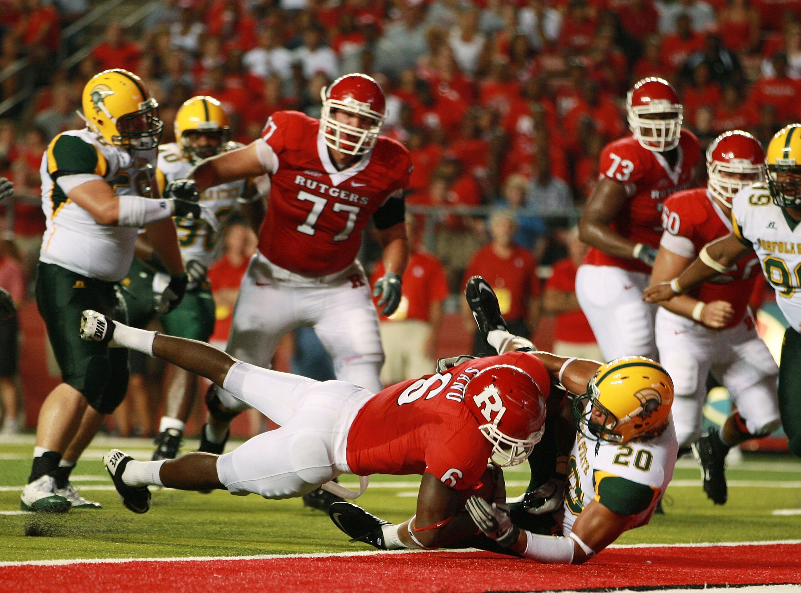 NEW BRUNSWICK, NJ - SEPTEMBER 02:  Mohamed Sanu #6 of the Rutgers Scarlet Knights successfully scores a 2-point conversion during the third quarter against the Norfolk State Spartans at Rutgers Stadium on September 2, 2010 in New Brunswick, New Jersey. Th
