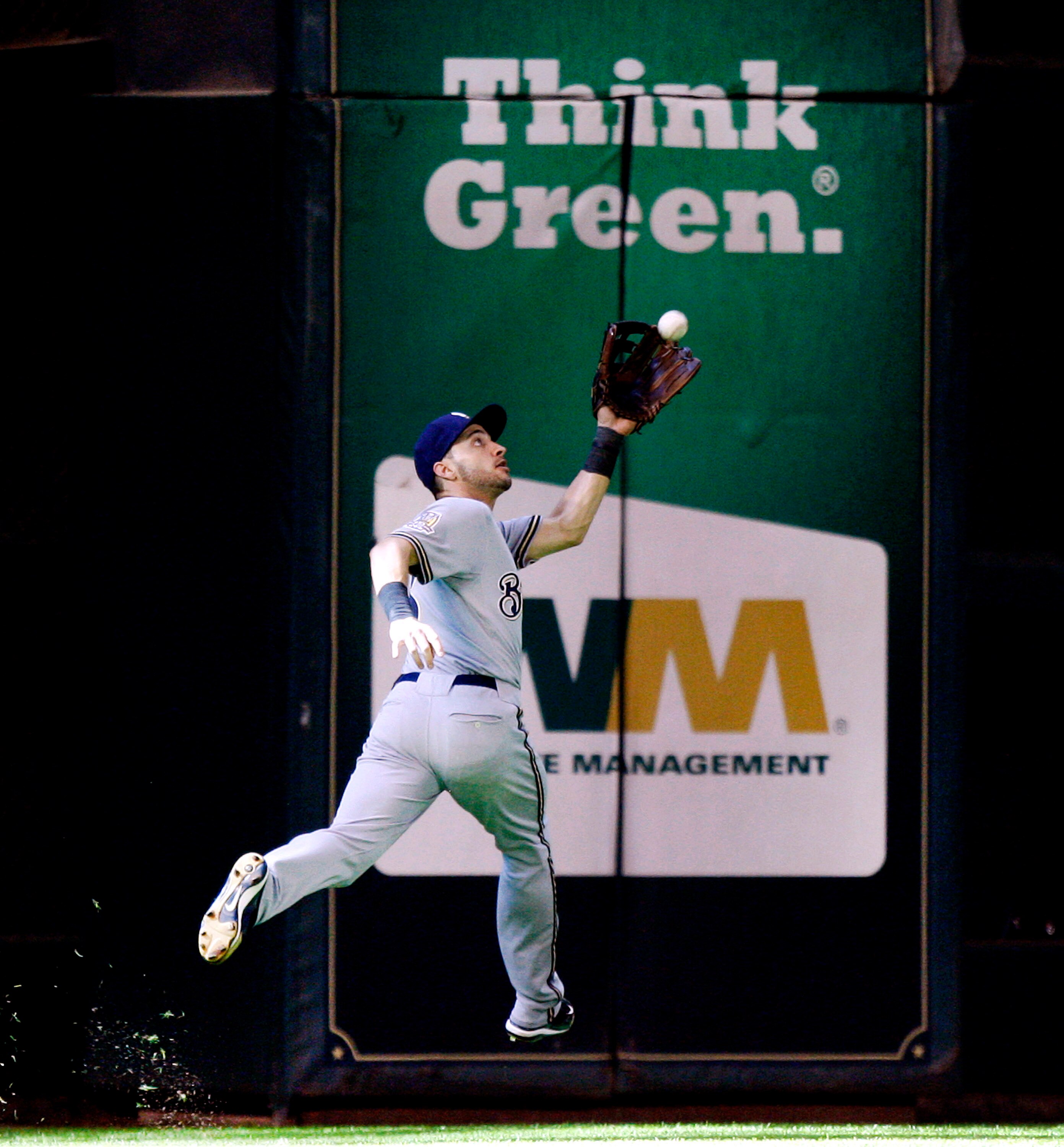 HOUSTON - SEPTEMBER 15:  Left fielder Ryan Braun #8 of the Milwaukee Brewers makes a running catch on a ball hit by Angel Sanchez of the Houston Astros in the ninth inning at Minute Maid Park on September 15, 2010 in Houston, Texas.  (Photo by Bob Levey/G