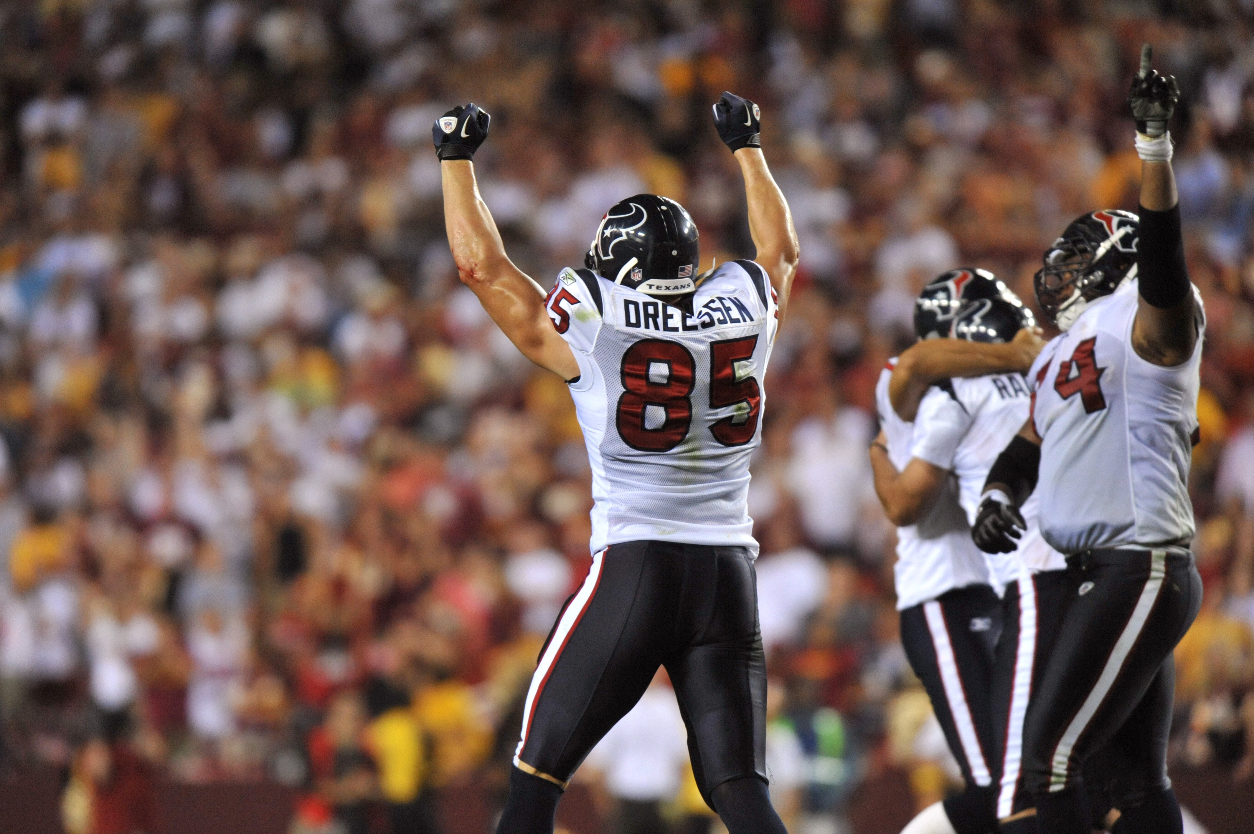 LANDOVER - SEPTEMBER 19:  Joel Dreessen #85 of the Houston Texans celebrates the overtime victory over the Washington Redskins at FedExField on September 19, 2010 in Landover, Maryland. The Texans defeated the Redskins 30-27 in overtime. (Photo by Larry F