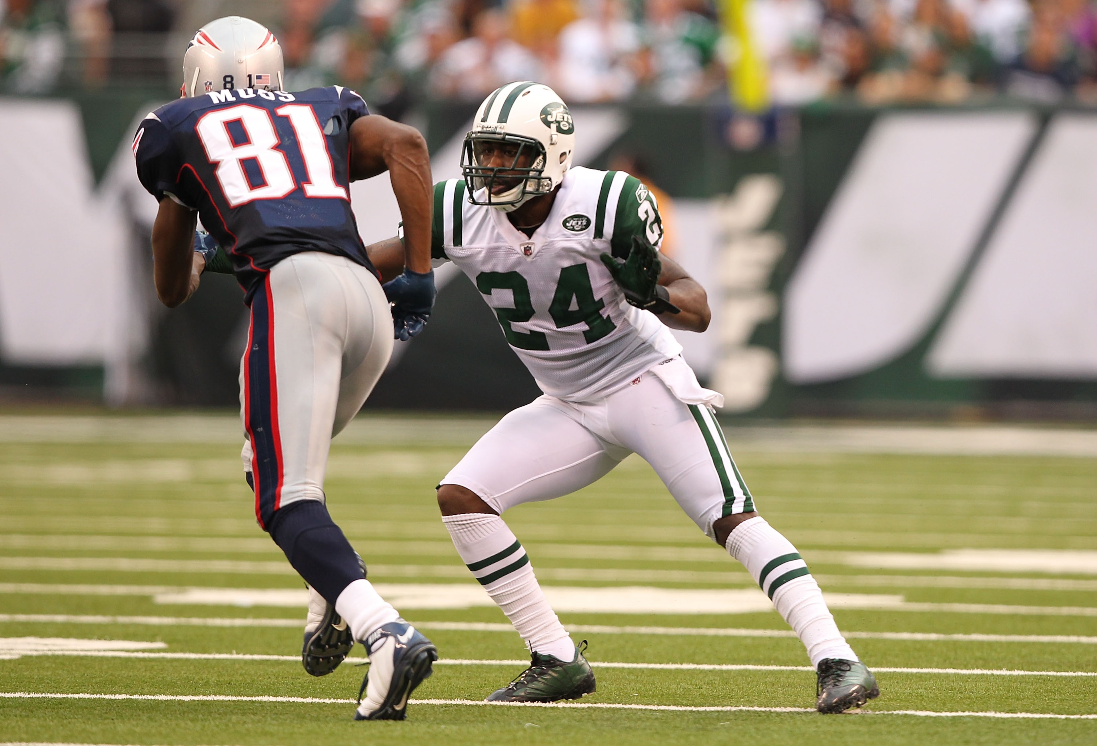 EAST RUTHERFORD, NJ - SEPTEMBER 19:  Darrelle Revis #24 of the New York Jets defends against Randy Moss #81 of the New England Patriots during their  game on September 19, 2010 at the New Meadowlands Stadium  in East Rutherford, New Jersey.  (Photo by Al 