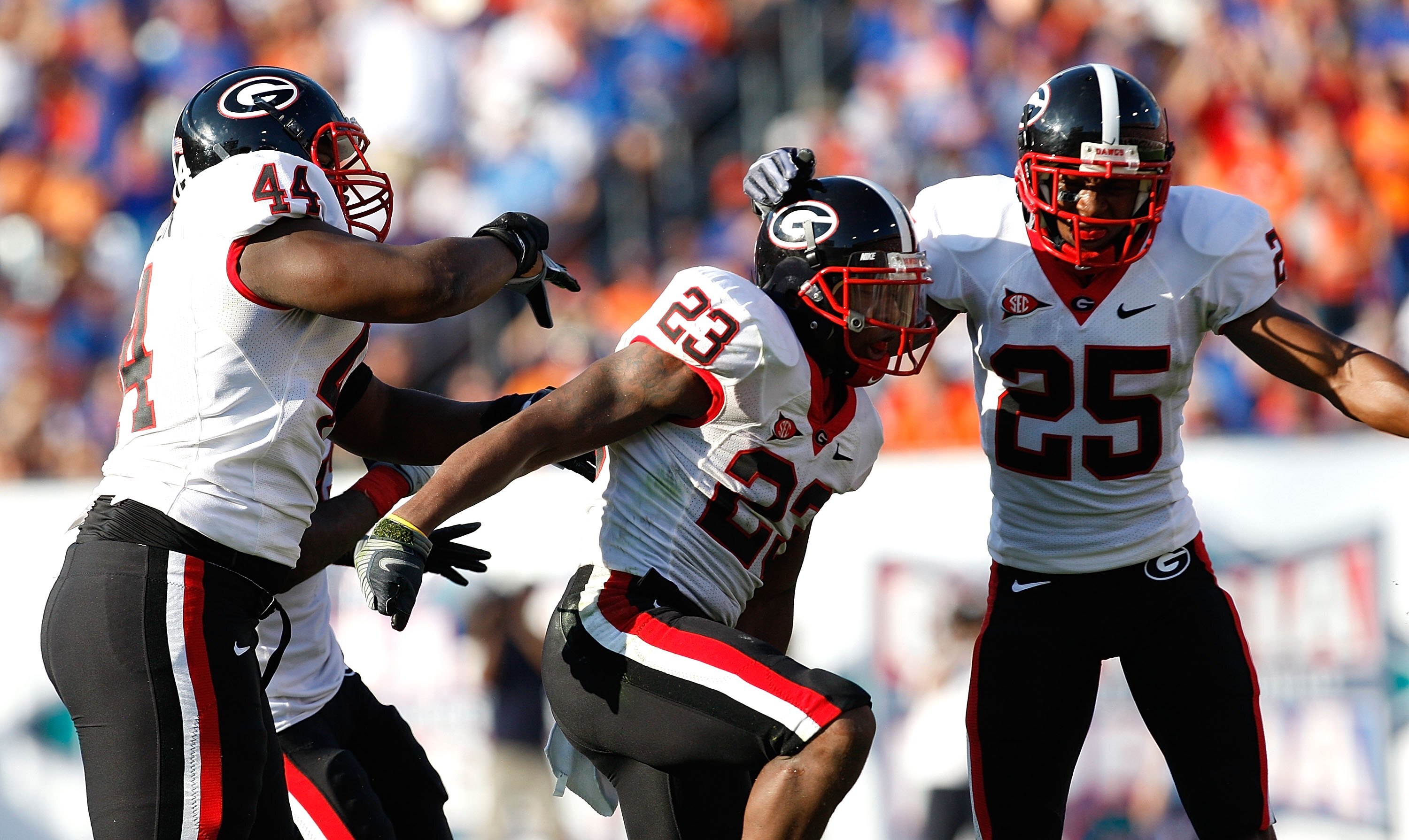 JACKSONVILLE, FL - OCTOBER 31:  The Georgia Bulldogs defense celebrates against the Florida Gators at Jacksonville Municipal Stadium on October 31, 2009 in Jacksonville, Florida.  (Photo by Kevin C. Cox/Getty Images)
