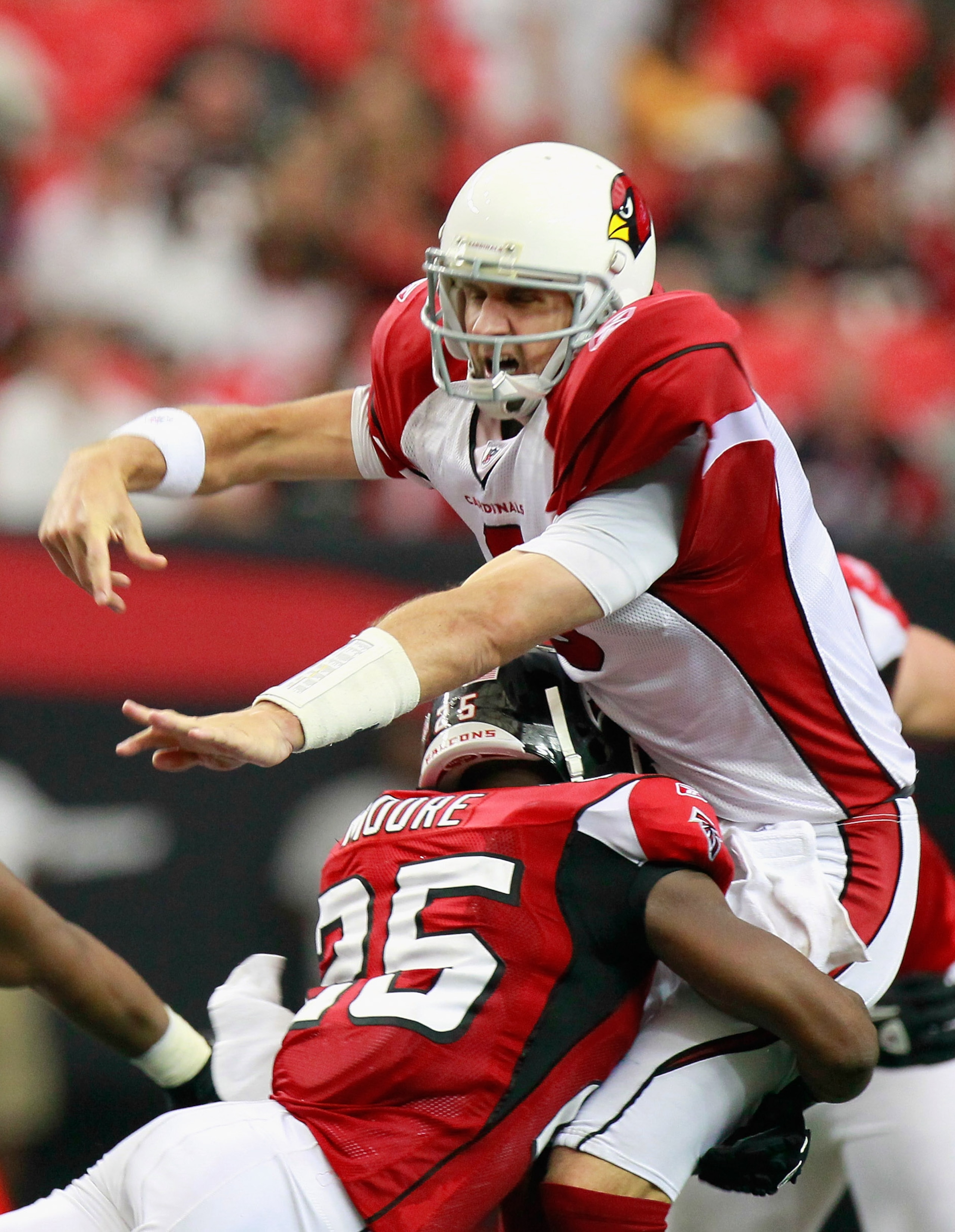 ATLANTA - SEPTEMBER 19:  William Moore #25 of the Atlanta Falcons tackles quarterback Derek Anderson #3 of the Arizona Cardinals at Georgia Dome on September 19, 2010 in Atlanta, Georgia.  (Photo by Kevin C. Cox/Getty Images)