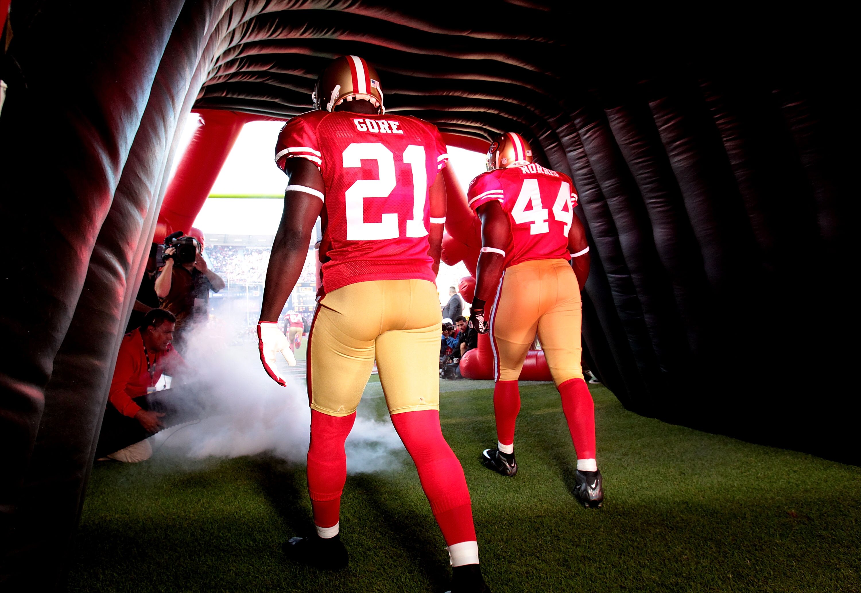 SAN FRANCISCO - SEPTEMBER 20:  Frank Gore #21 of the San Francisco 49ers is introduced against the New Orleans Saints during an NFL game at Candlestick Park on September 20, 2010 in San Francisco, California.  (Photo by Jed Jacobsohn/Getty Images)