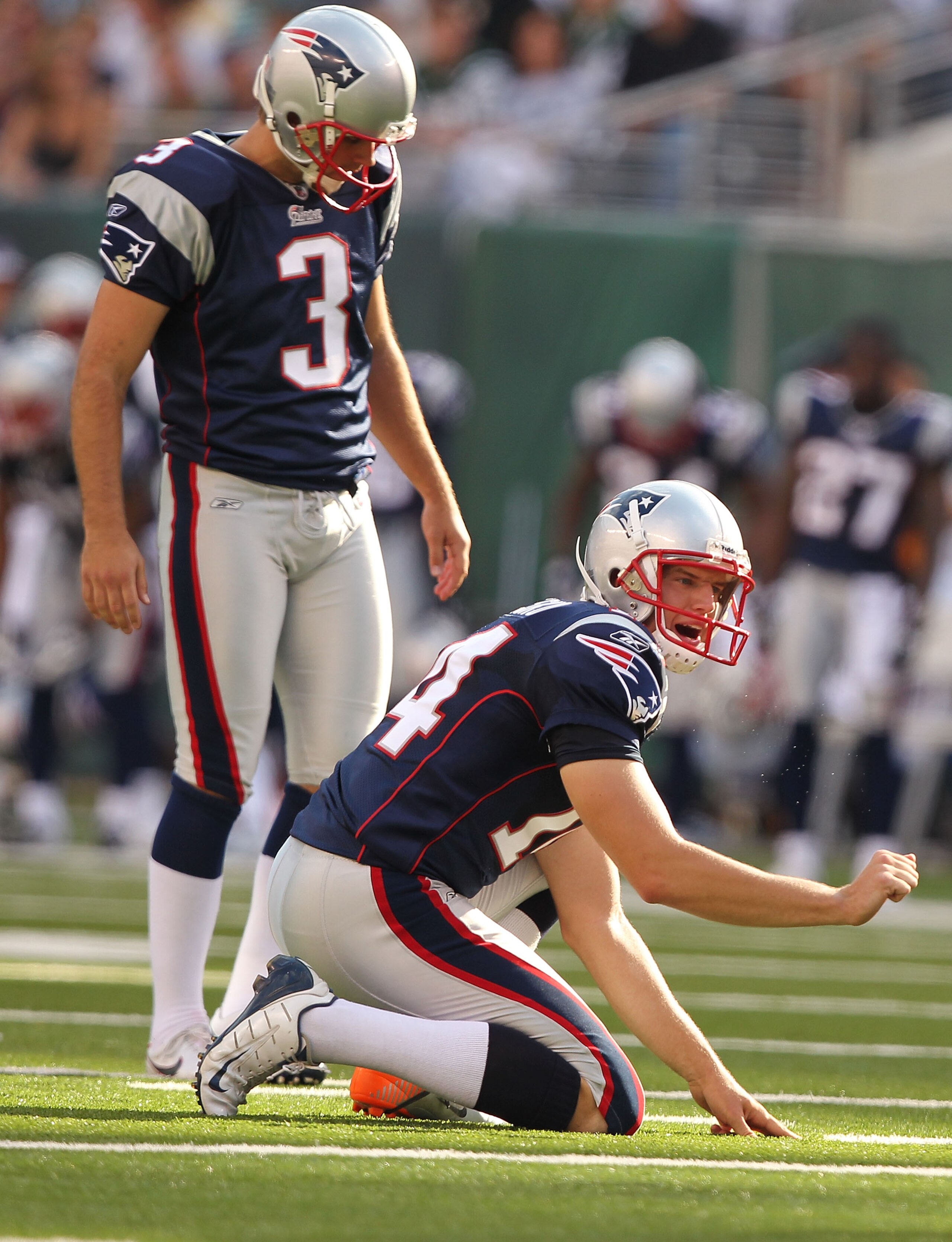 EAST RUTHERFORD, NJ - SEPTEMBER 19:  Stephen Gostkowski #3of the New England Patriots gets ready to kick a field goal as Zoltan Mesko #14 holds against the New York Jets  on September 19, 2010 at the New Meadowlands Stadium  in East Rutherford, New Jersey