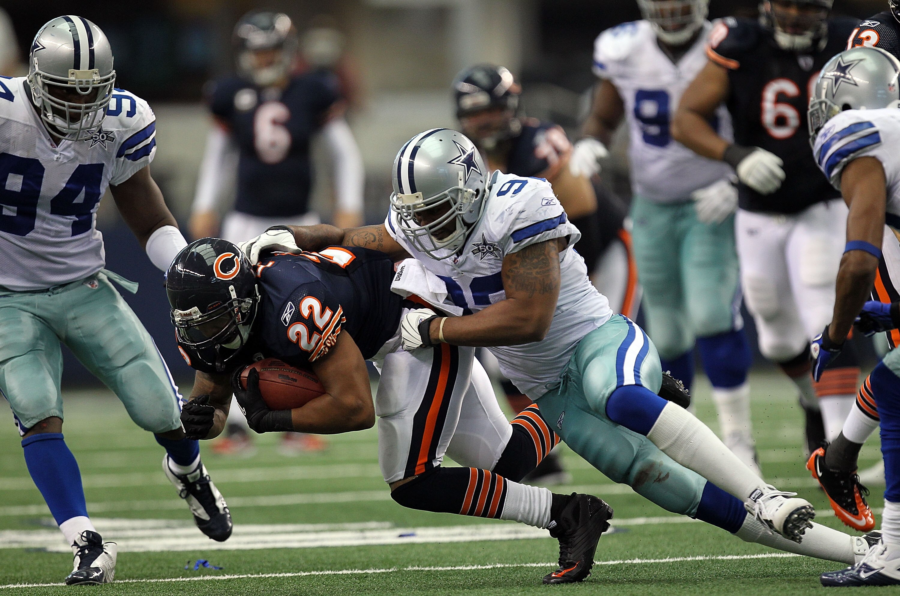 ARLINGTON, TX - SEPTEMBER 19:  Running back Matt Forte #22 of the Chicago Bears runs the ball against Anthony Spencer #93 of the Dallas Cowboys at Cowboys Stadium on September 19, 2010 in Arlington, Texas.  (Photo by Ronald Martinez/Getty Images)