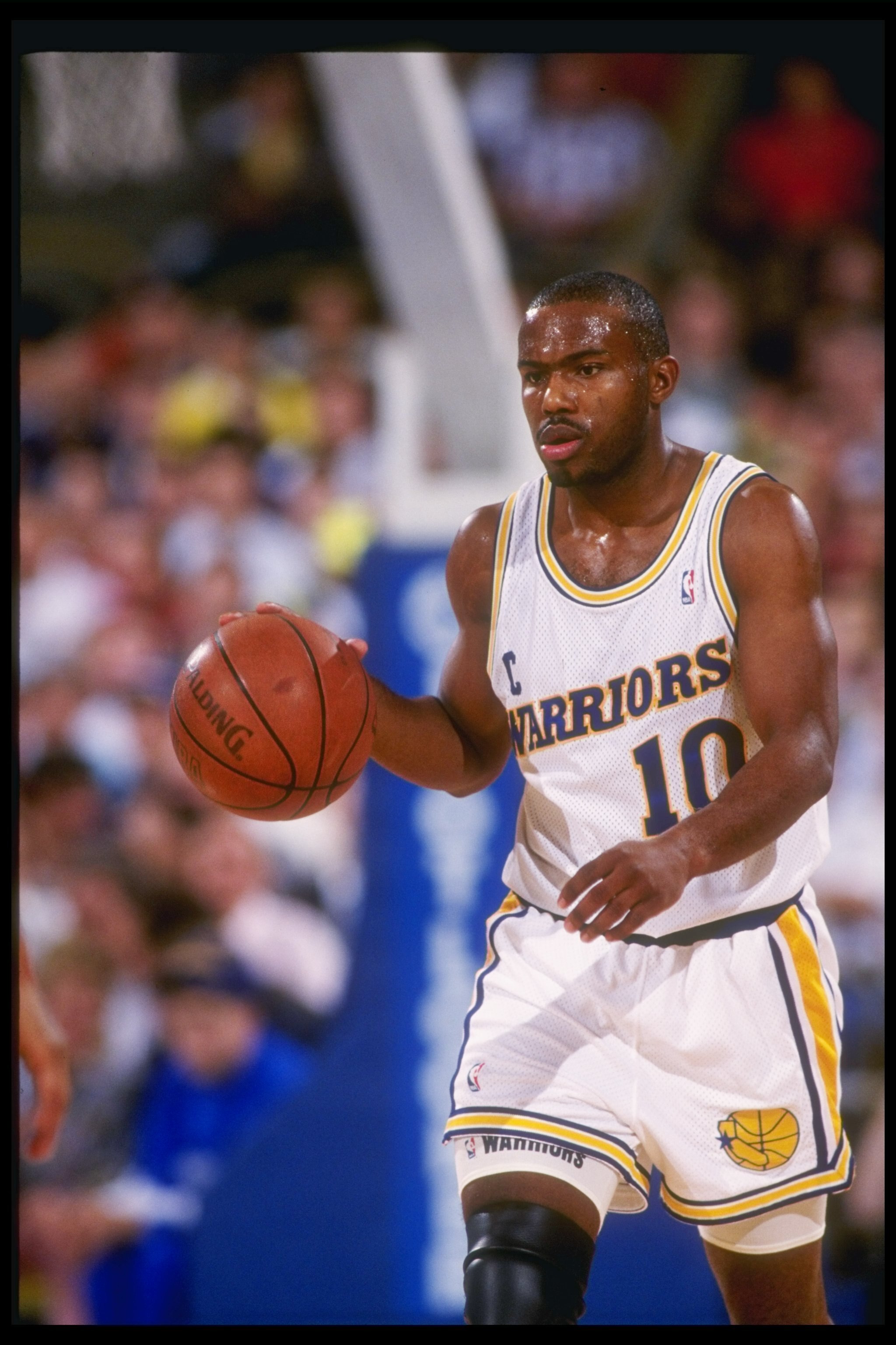 1990-1991:  Guard Tim Hardaway of the Golden State Warriors in action with the basketball. Mandatory Credit: Otto Greule  /Allsport