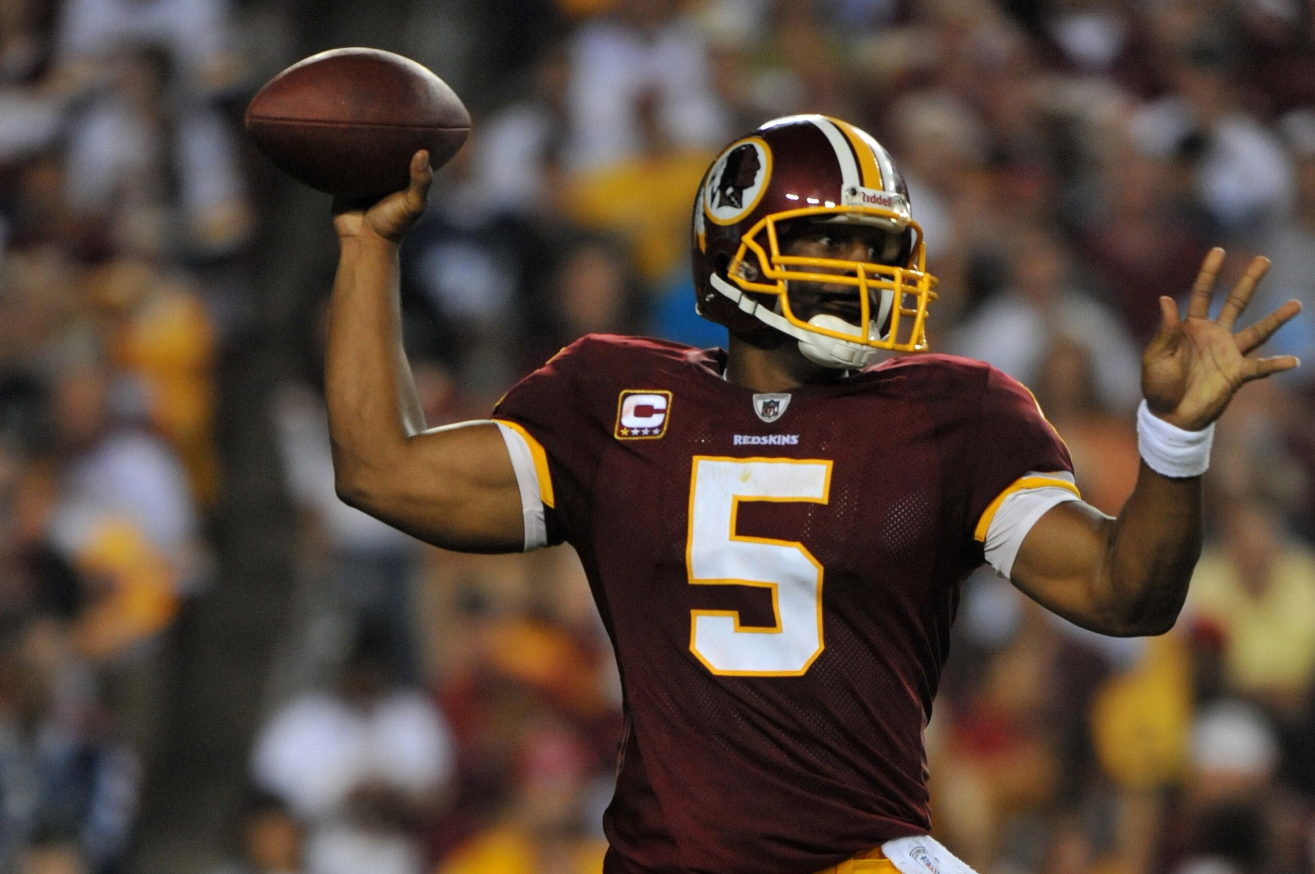 LANDOVER - SEPTEMBER 12:  Donovan McNabb #5 of the Washington Redskins passes during the NFL season opener against the Dallas Cowboys at FedExField on September 12, 2010 in Landover, Maryland. The Redskins defeated the Cowboys 13-7. (Photo by Larry French