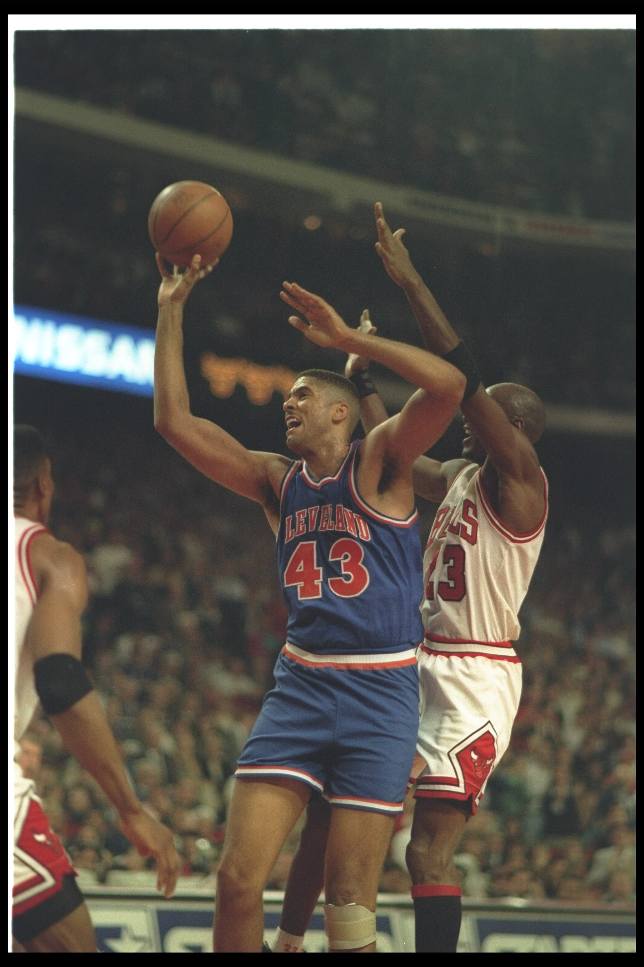 13 May 1993:  Center Brad Daugherty of the Cleveland Cavaliers goes up for two as a Chicago Bulls player covers him during a game at the United Center in Chicago, Illinois.  The Bulls won the game, 104-85. Mandatory Credit: Jonathan Daniel  /Allsport
