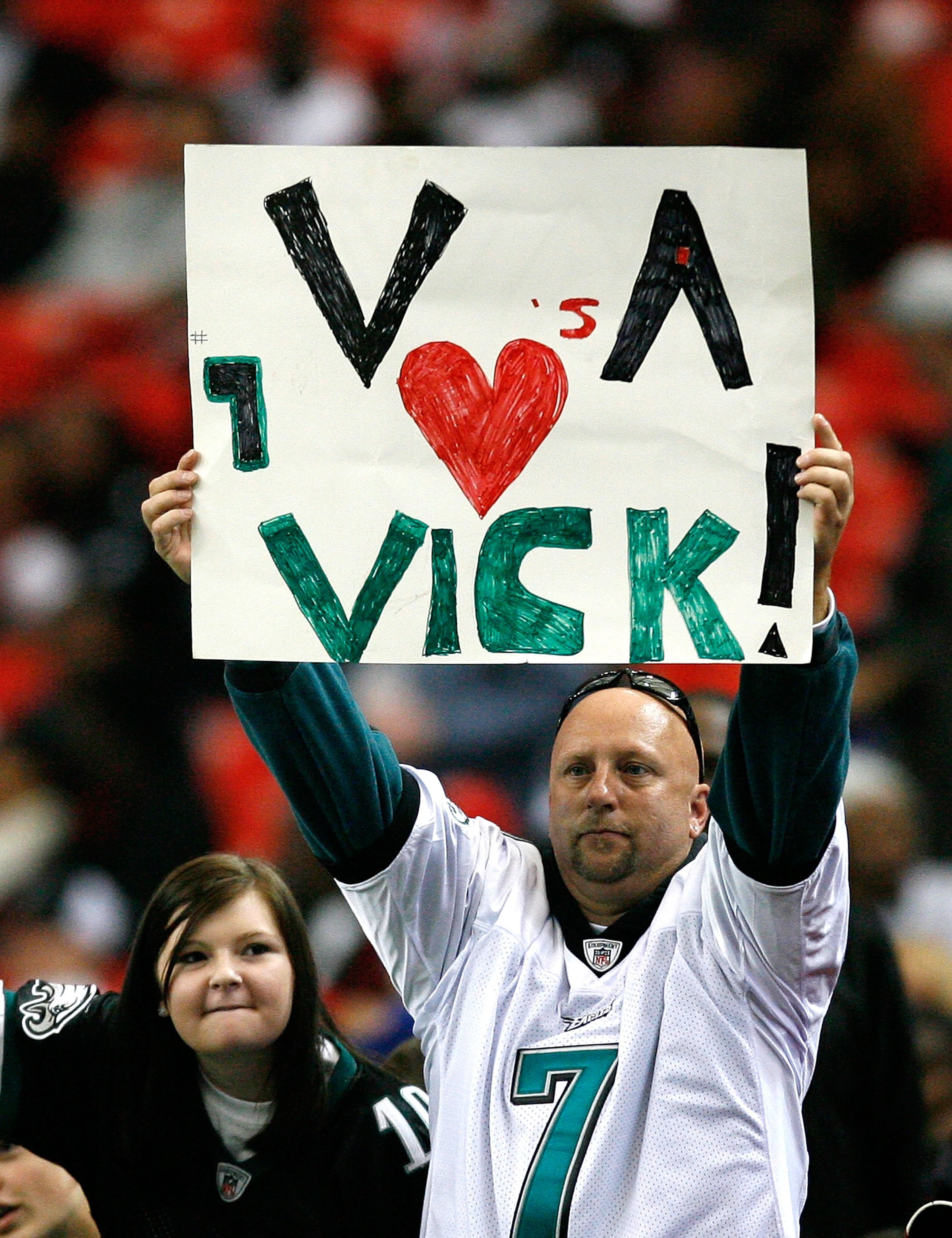 ATLANTA - DECEMBER 06: A fan of Michael Vick #7 (not pictured) of the Philadelphia Eagles holds up a sign during the game against the Atlanta Falcons at Georgia Dome on December 6, 2009 in Atlanta, Georgia. (Photo by Kevin C. Cox/Getty Images) ATLANTA - DECEMBER 06: A fan of Michael Vick #7 (not pictured) of the Philadelphia Eagles holds up a sign during the game against the Atlanta Falcons at Georgia Dome on December 6, 2009 in Atlanta, Georgia. (Photo by Kevin C. Cox/Getty Images)