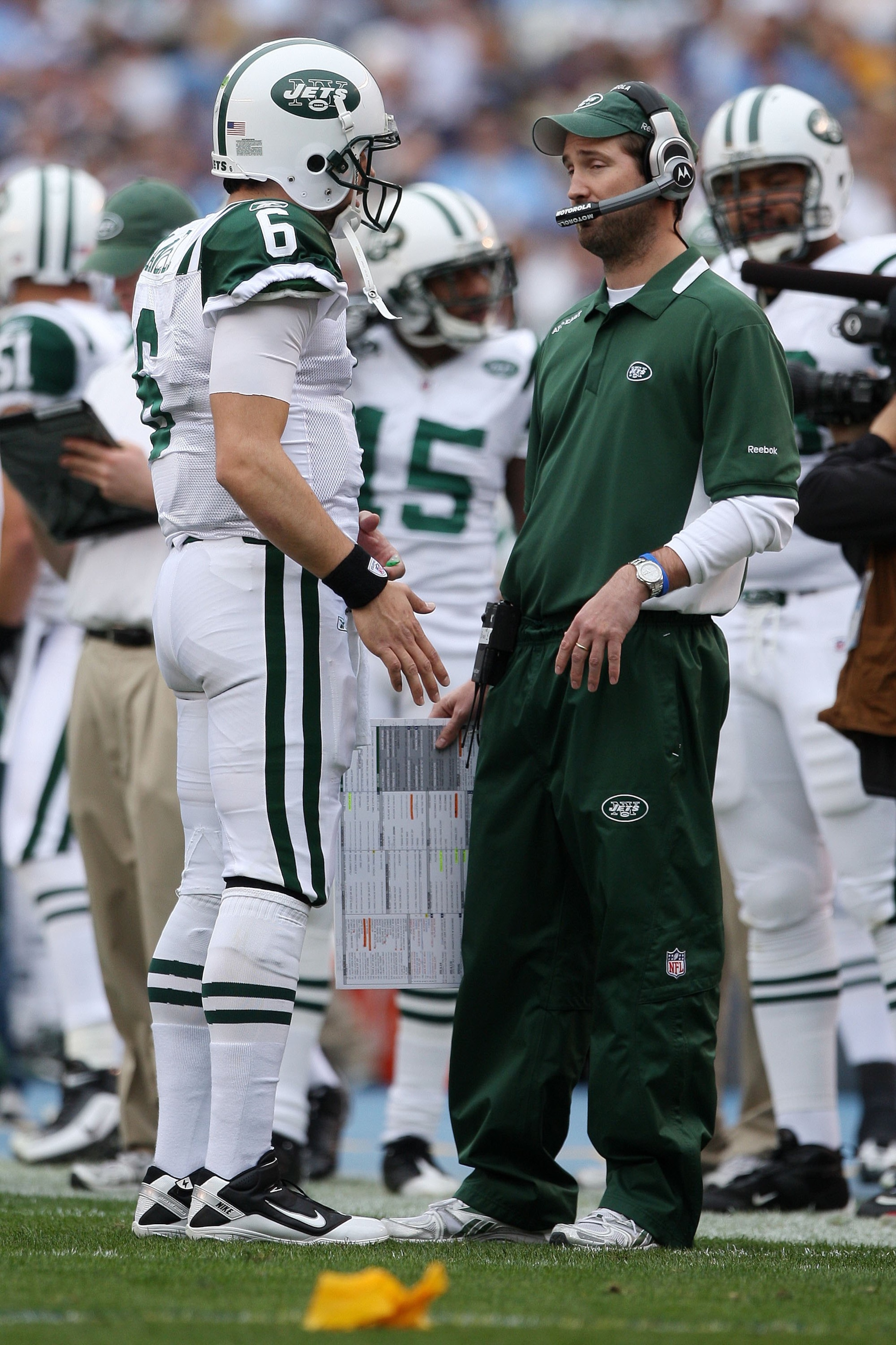 SAN DIEGO - JANUARY 17:  Quarterback Mark Sanchez #6 of the New York Jets speaks with offensive coordinator Brian Schottenheimer during the AFC Divisional Playoff Game against the San Diego Chargers at Qualcomm Stadium on January 17, 2010 in San Diego, Ca