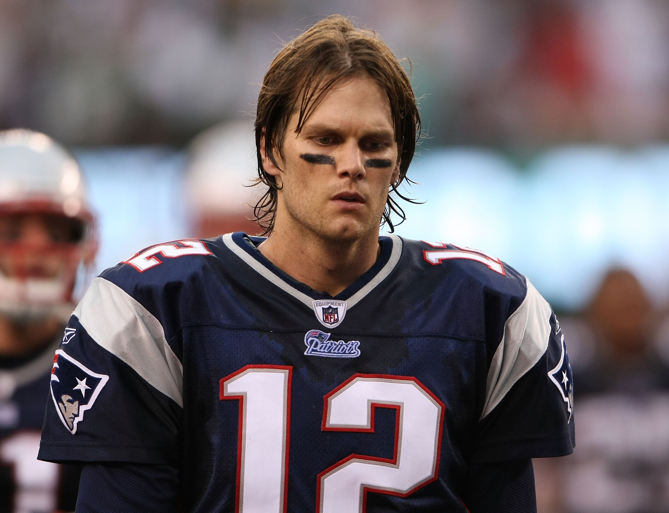 EAST RUTHERFORD, NJ - SEPTEMBER 19:  Tom Brady #12  of the New England Patriots looks on against the New York Jetsduring their  game on September 19, 2010 at the New Meadowlands Stadium  in East Rutherford, New Jersey.  (Photo by Al Bello/Getty Images)