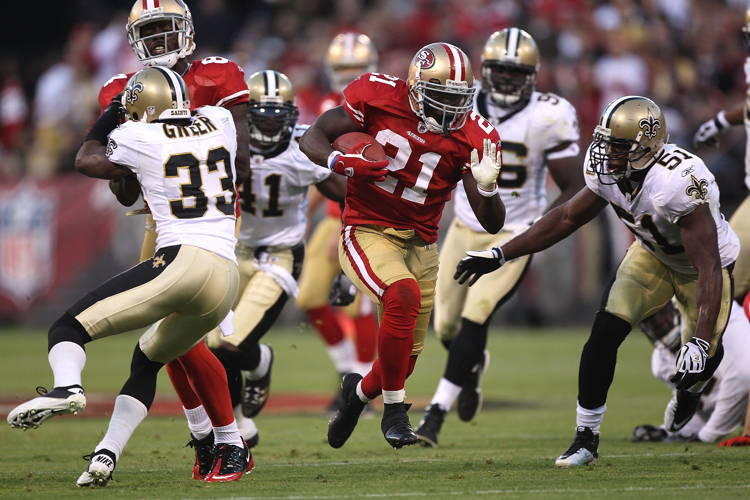 SAN FRANCISCO - SEPTEMBER 20:  Frank Gore #21 of the San Francisco 49ers runs against the New Orleans Saints during an NFL game at Candlestick Park on September 20, 2010 in San Francisco, California.  (Photo by Jed Jacobsohn/Getty Images)