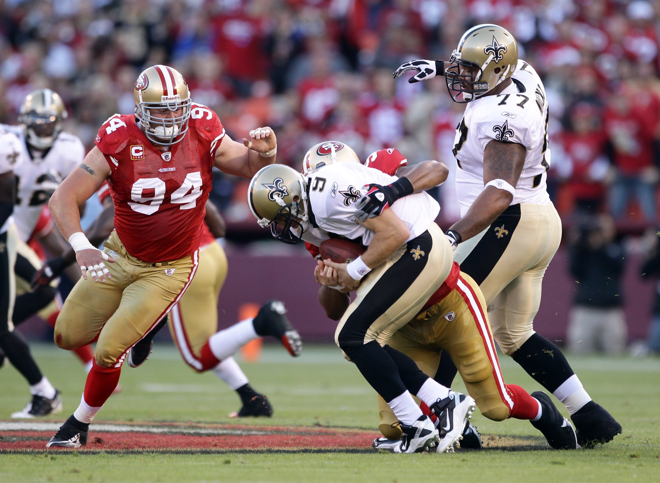 SAN FRANCISCO - SEPTEMBER 20:  Drew Brees #9 of the New Orleans Saints is sacked by Ahmad Brooks #55 of the San Francisco 49ers at Candlestick Park on September 20, 2010 in San Francisco, California.  (Photo by Ezra Shaw/Getty Images)
