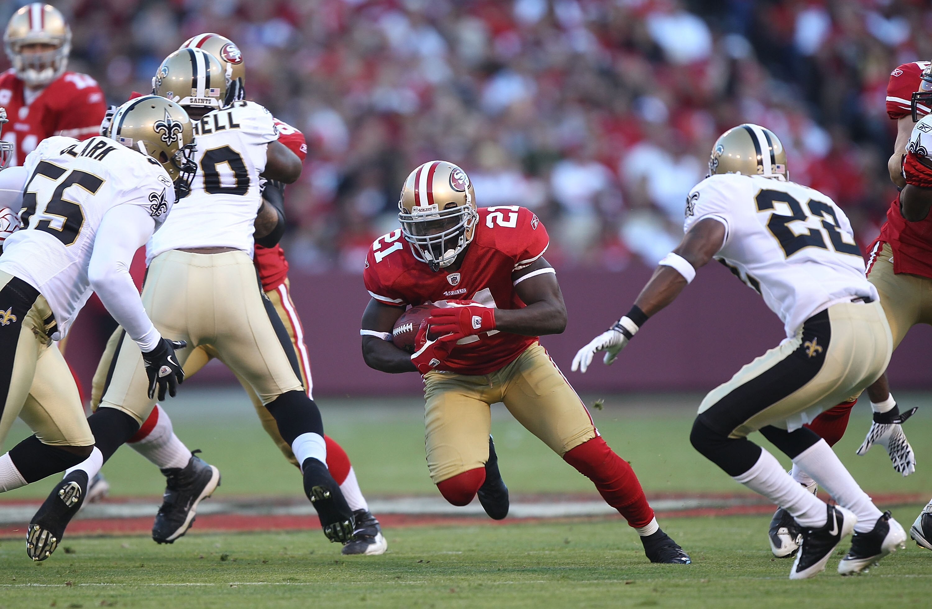 SAN FRANCISCO - SEPTEMBER 20:  Frank Gore #21 of the San Francisco 49ers runs against the New Orleans Saints during an NFL game at Candlestick Park on September 20, 2010 in San Francisco, California.  (Photo by Jed Jacobsohn/Getty Images)