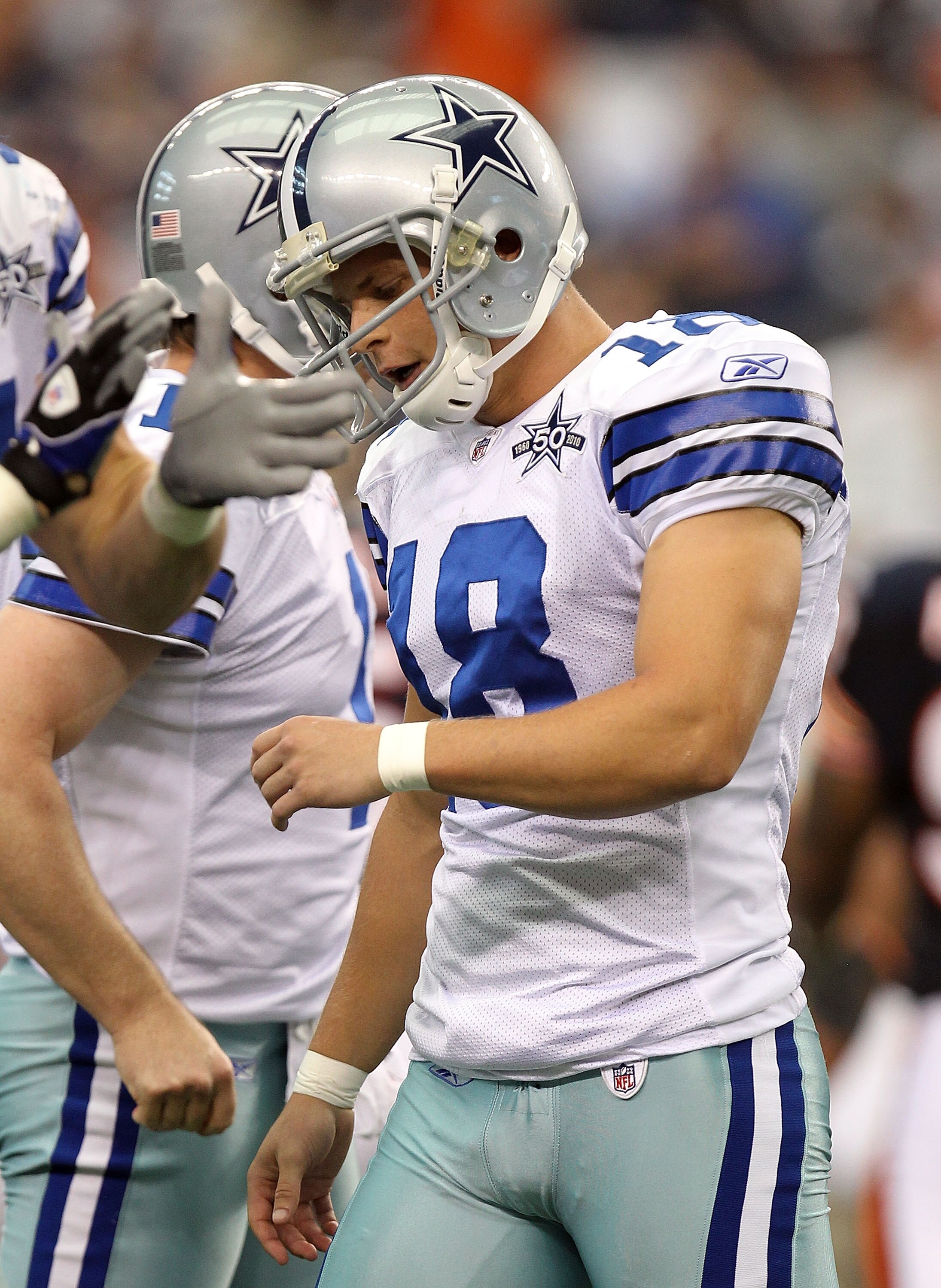 ARLINGTON, TX - SEPTEMBER 19:  Kicker David Buehler #18 of the Dallas Cowboys reacts after a missed field goal attempt against the Chicago Bears in the fourth quarter at Cowboys Stadium on September 19, 2010 in Arlington, Texas.  (Photo by Ronald Martinez