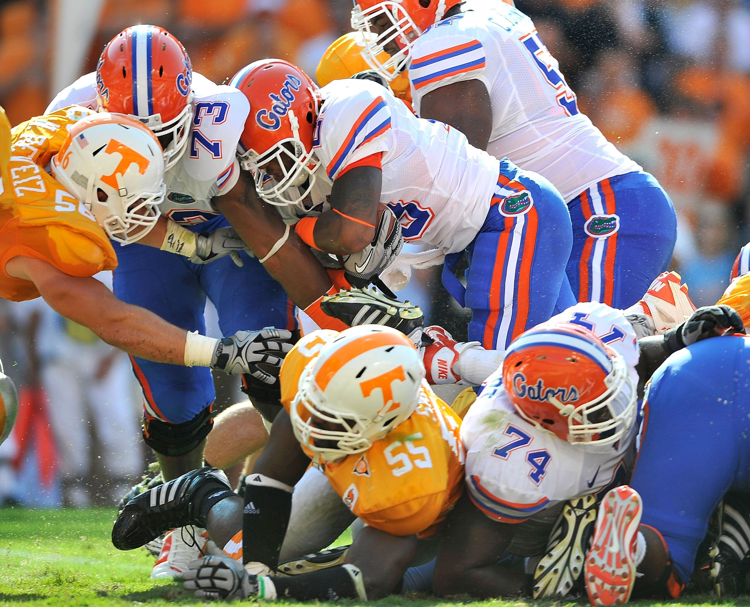 KNOXVILLE, TN - SEPTEMBER 18:  Mike Gillislee #23 of the Florida Gators drives over the goal line for a touchdown against  the Tennessee Volunteers during the first half at Neyland Stadium on September 18, 2010 in Knoxville, Tennessee.  (Photo by Grant Ha