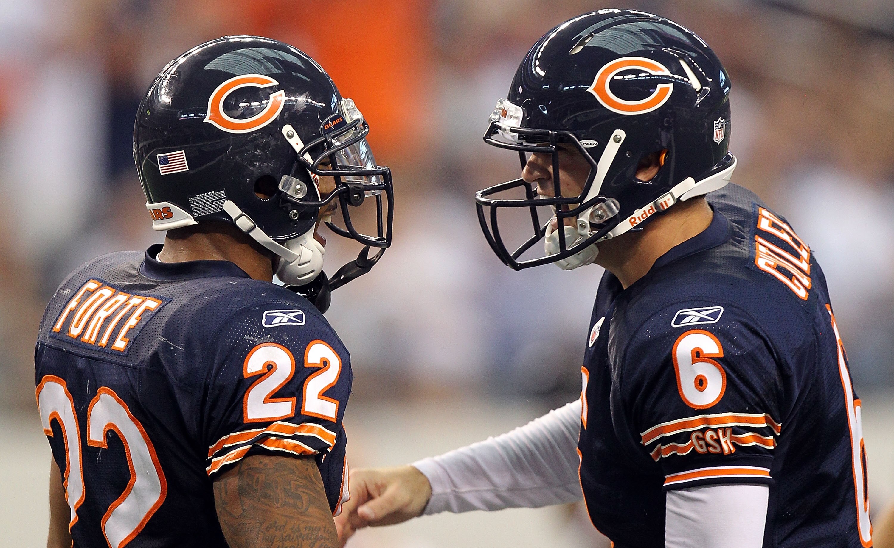 ARLINGTON, TX - SEPTEMBER 19:  (L-R) Running back Matt Forte #22 and Jay Cutler #6 of the Chicago Bears celebrate a touchdown against the Dallas Cowboys in the fourth quarter at Cowboys Stadium on September 19, 2010 in Arlington, Texas.  (Photo by Ronald 