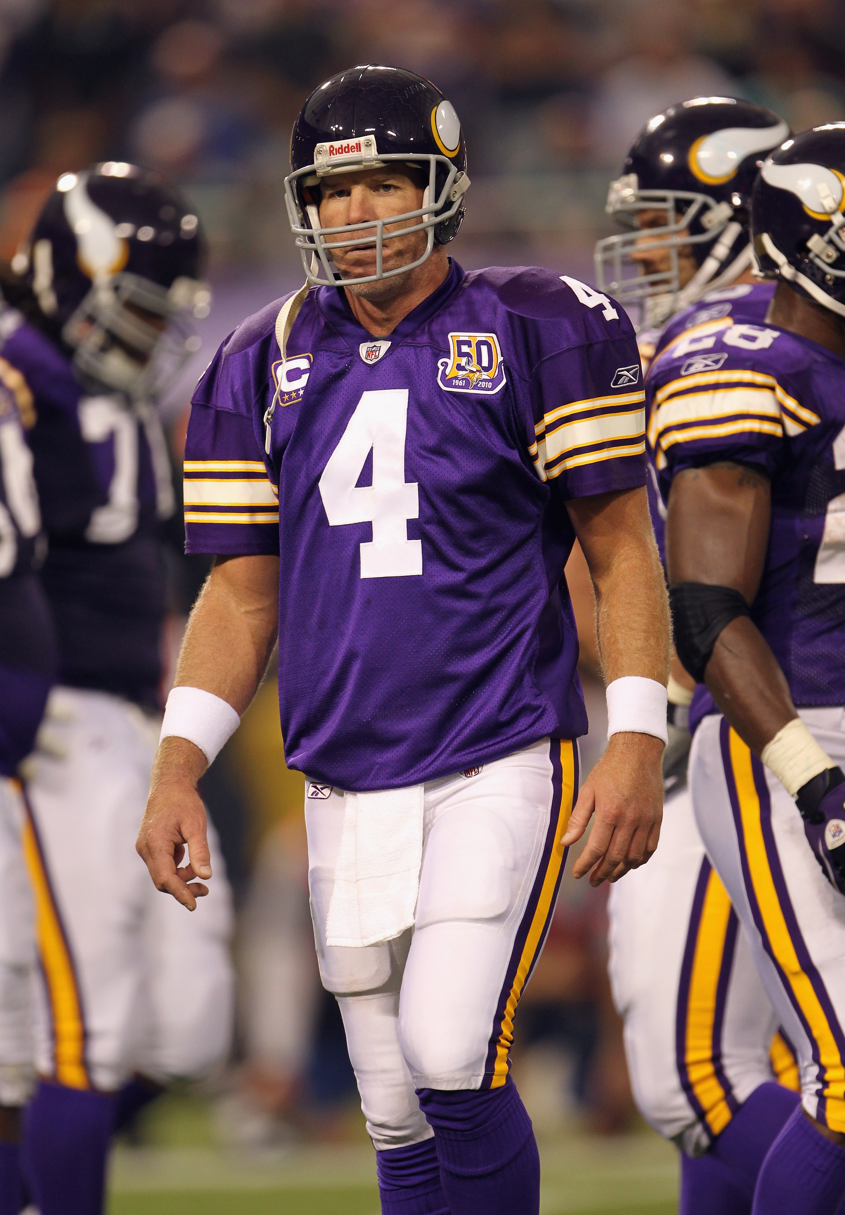 MINNEAPOLIS - SEPTEMBER 19:  Quarterback Brett Favre #4 of the Minnesota Vikings walks off the field after failing to make a first down during the first half of the game against the Miami Dolphins on September 19, 2010 at Hubert H. Humphrey Metrodome in M
