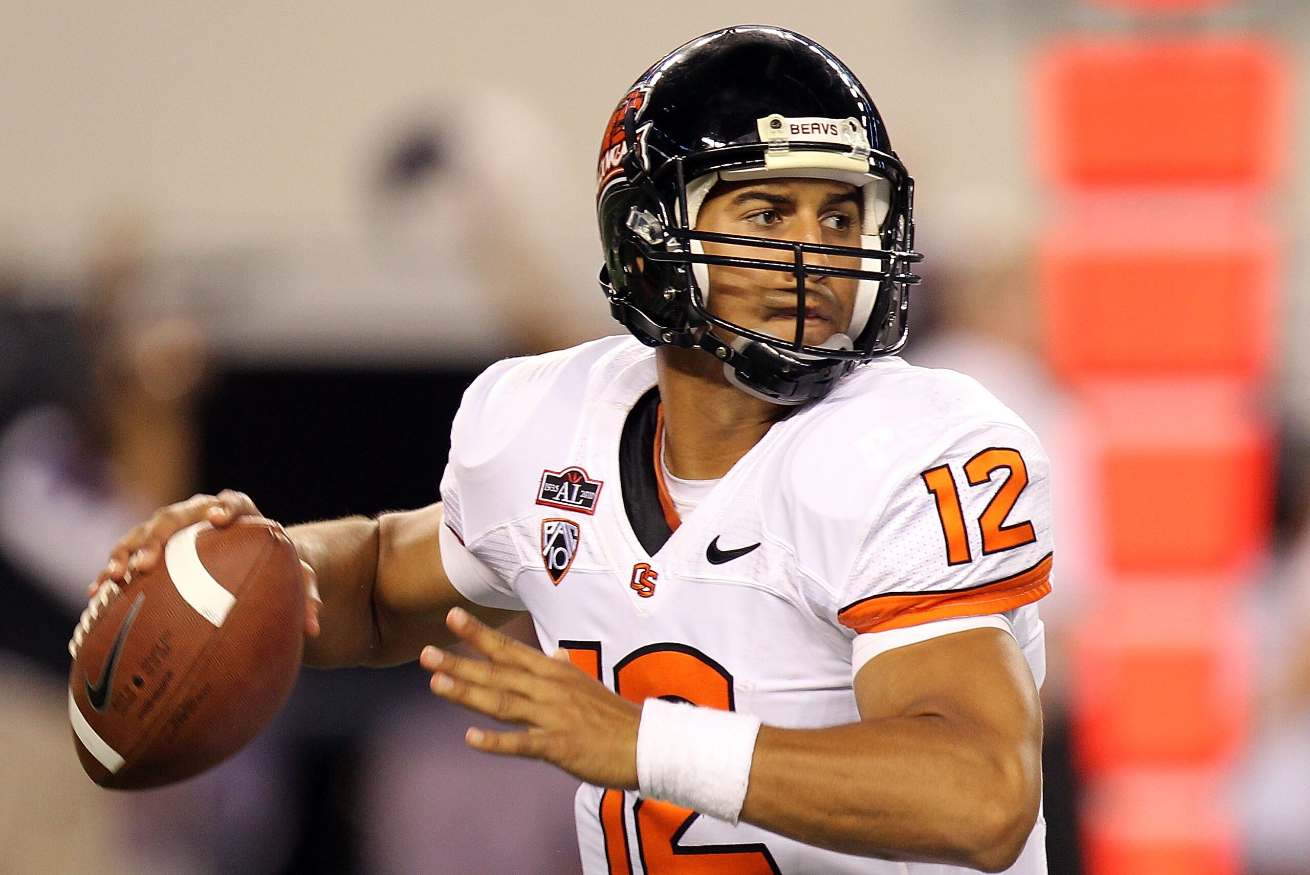 ARLINGTON, TX - SEPTEMBER 04:  Quarterback Ryan Katz #12 of the Oregon State Beavers drops back to pass against the TCU Horned Frogs at Cowboys Stadium on September 4, 2010 in Arlington, Texas.  (Photo by Ronald Martinez/Getty Images)