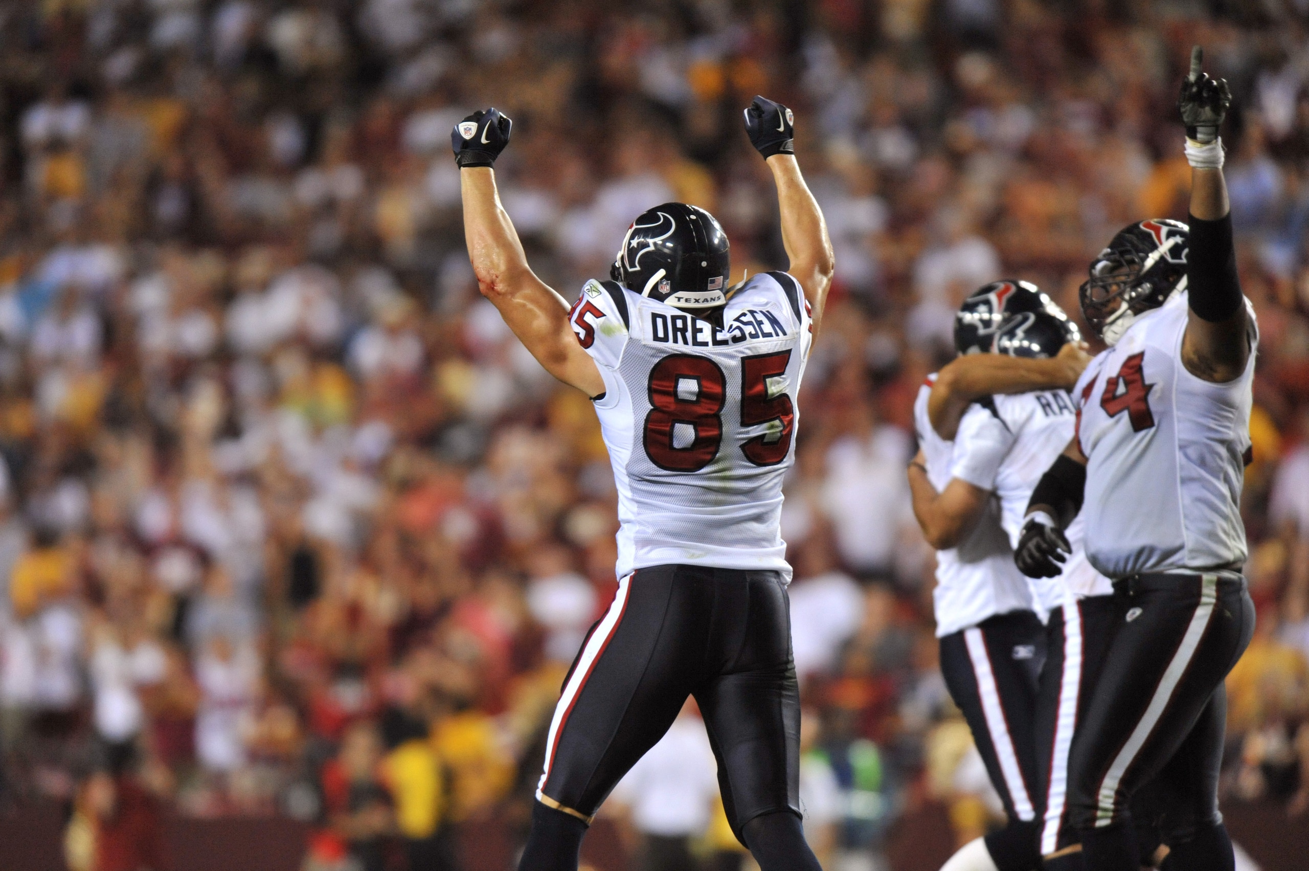 LANDOVER - SEPTEMBER 19:  Joel Dreessen #85 of the Houston Texans celebrates the overtime victory over the Washington Redskins at FedExField on September 19, 2010 in Landover, Maryland. The Texans defeated the Redskins 30-27 in overtime. (Photo by Larry F