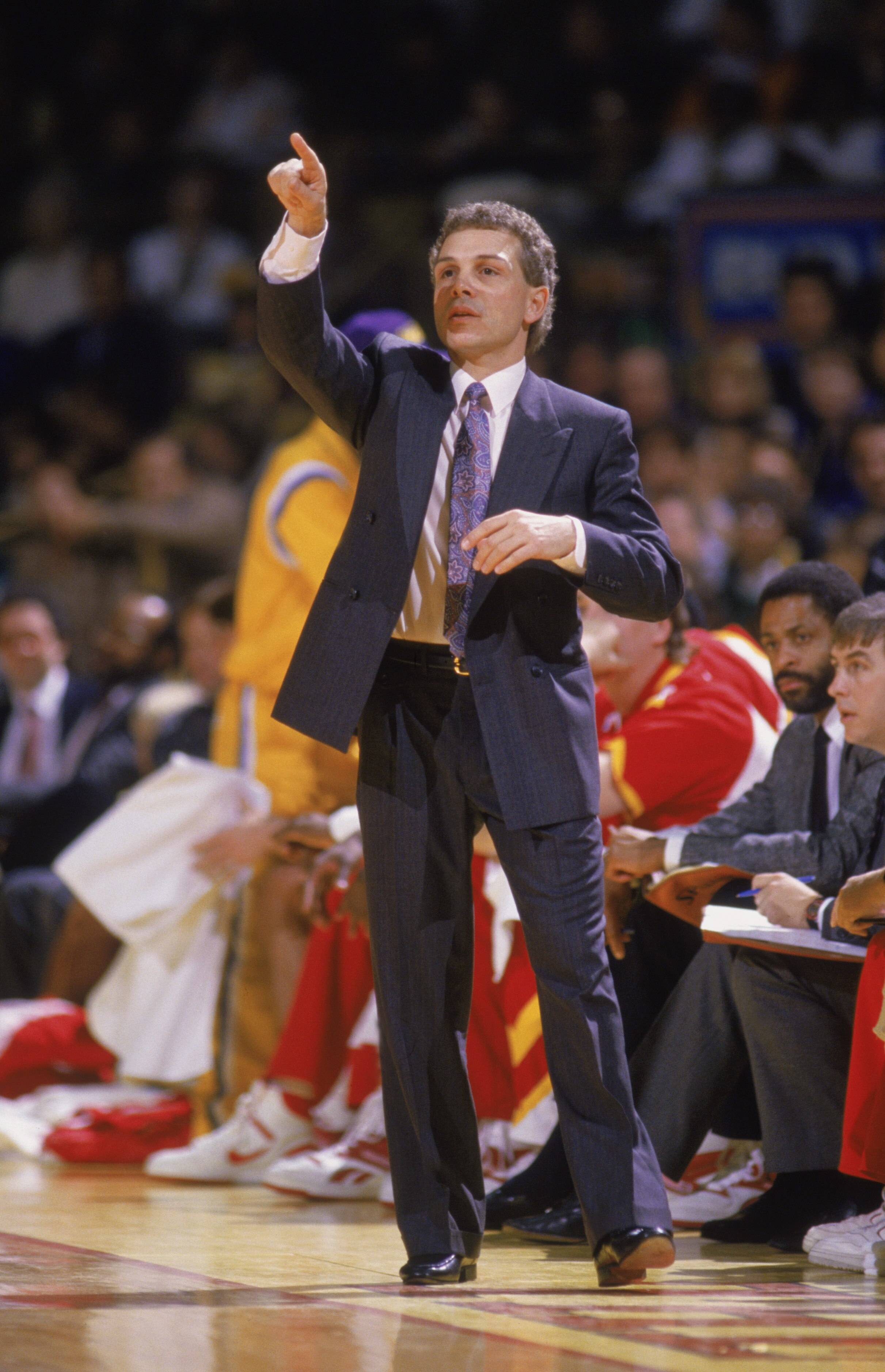 INGLEWOOD, CA - 1987:  Head coach Mike Fratello of the Atlanta Hawks calls out a play during a NBA game against the Los Angeles Lakers at the Great Western Forum in Inglewood, California in 1987.  (Photo by Rick Stewart/Getty Images)