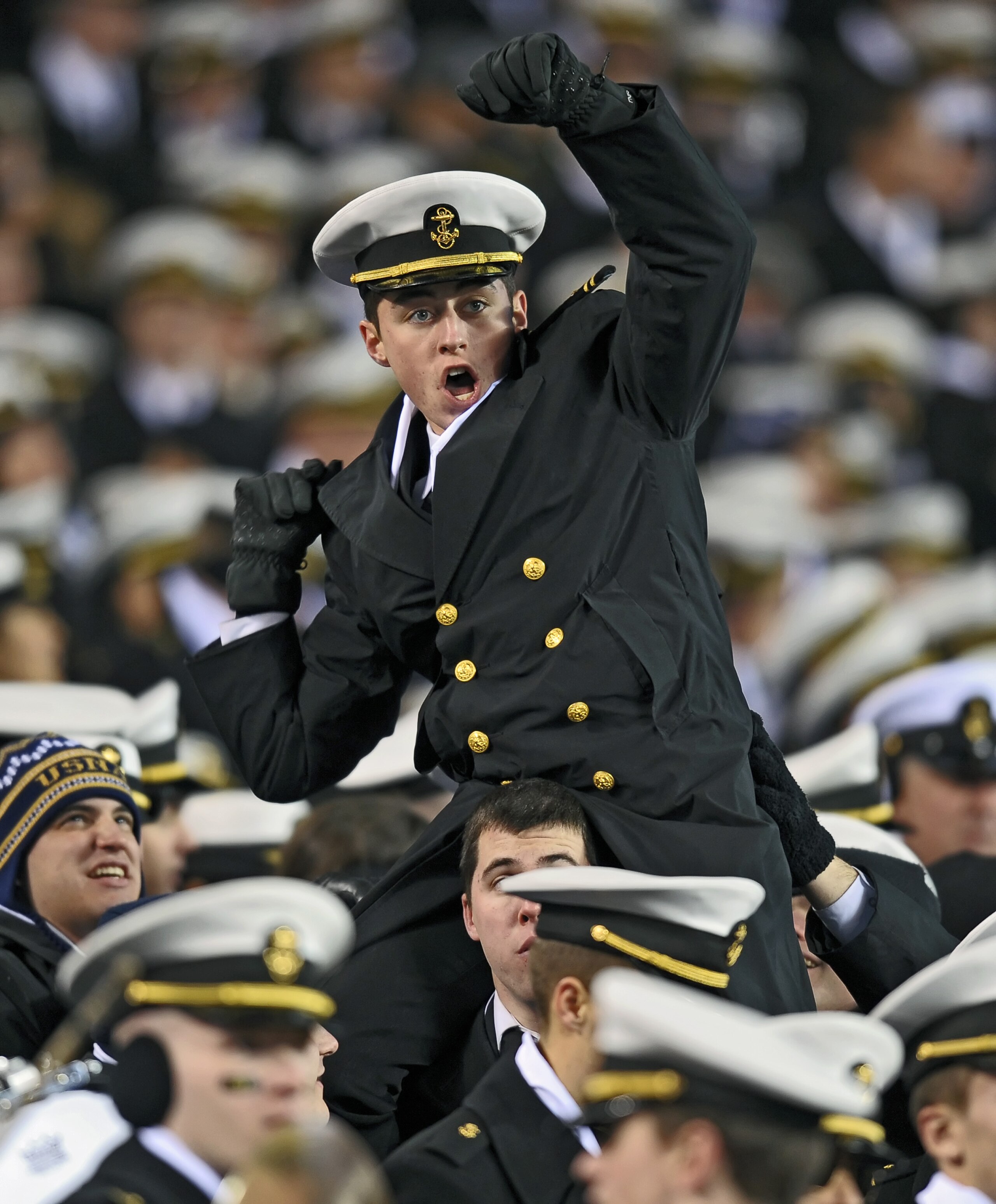PHILADELPHIA - DECEMBER 12: A Navy Midshipmen cheers during the game against Army Black Knights on December 12, 2009 at Lincoln Financial Field in Philadelphia, Pennsylvania. Navy won 17-3. (Photo by Drew Hallowell/Getty Images)