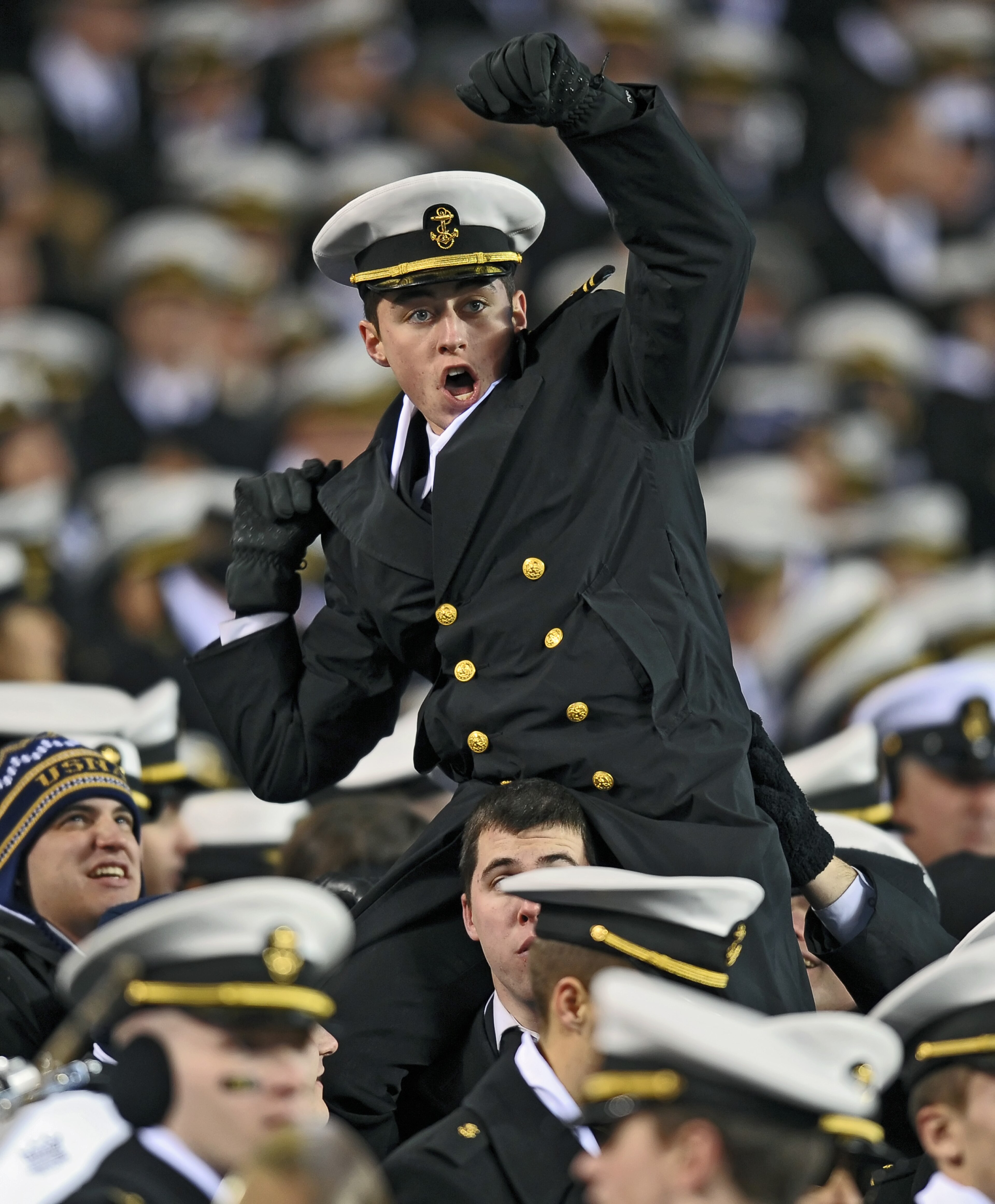 PHILADELPHIA - DECEMBER 12: A Navy Midshipmen cheers during the game against Army Black Knights on December 12, 2009 at Lincoln Financial Field in Philadelphia, Pennsylvania. Navy won 17-3. (Photo by Drew Hallowell/Getty Images)