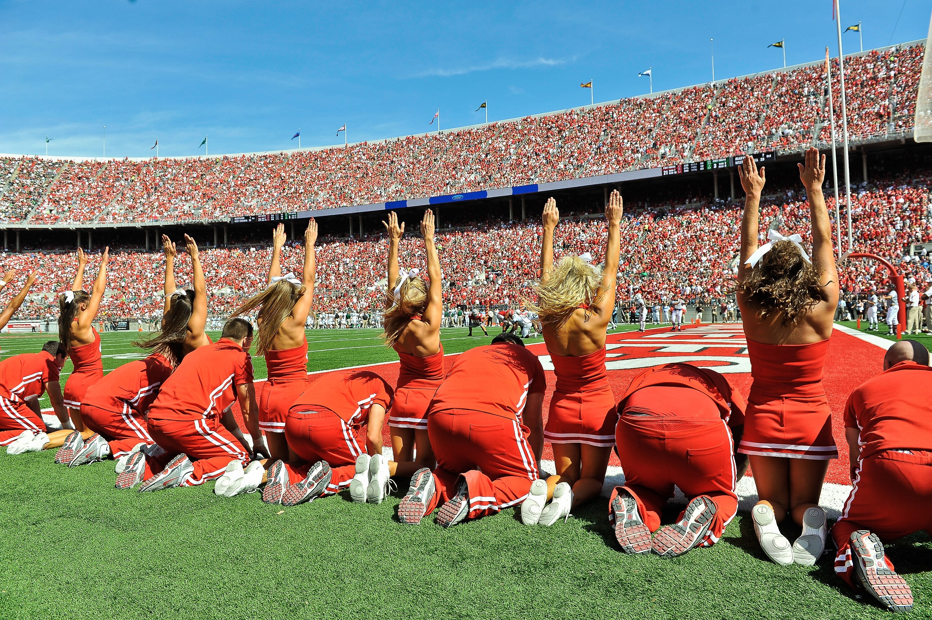 COLUMBUS, OH - SEPTEMBER 18:  Ohio State Buckeyes cheerleaders celebrate another Buckeye touchdown against the Ohio Bobcats at Ohio Stadium on September 18, 2010 in Columbus, Ohio.  (Photo by Jamie Sabau/Getty Images)
