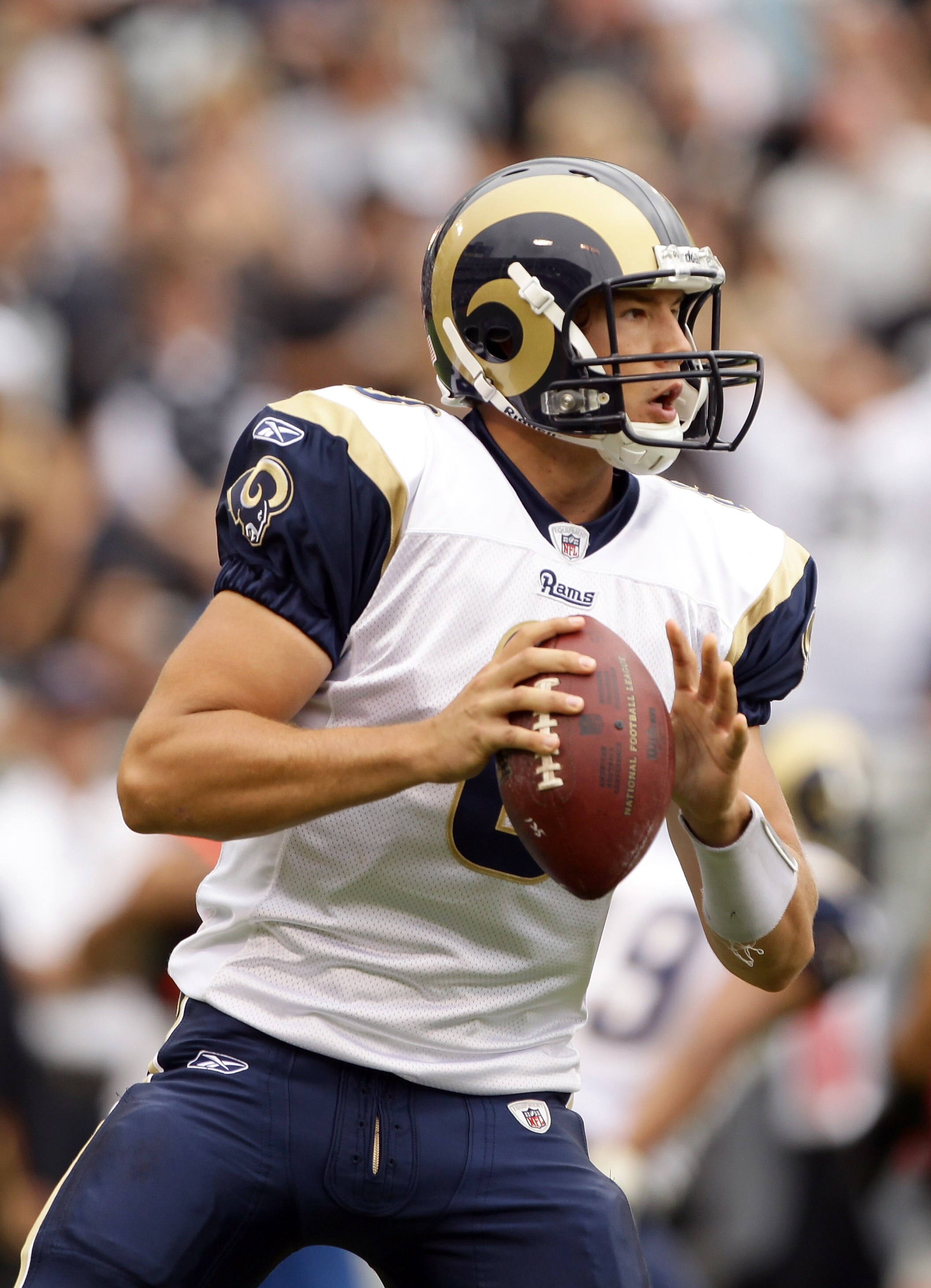 OAKLAND, CA - SEPTEMBER 19:  Sam Bradford #8 of the St. Louis Rams drops back to pass during their game against the Oakland Raiders at the Oakland-Alameda County Coliseum on September 19, 2010 in Oakland, California.  (Photo by Ezra Shaw/Getty Images)