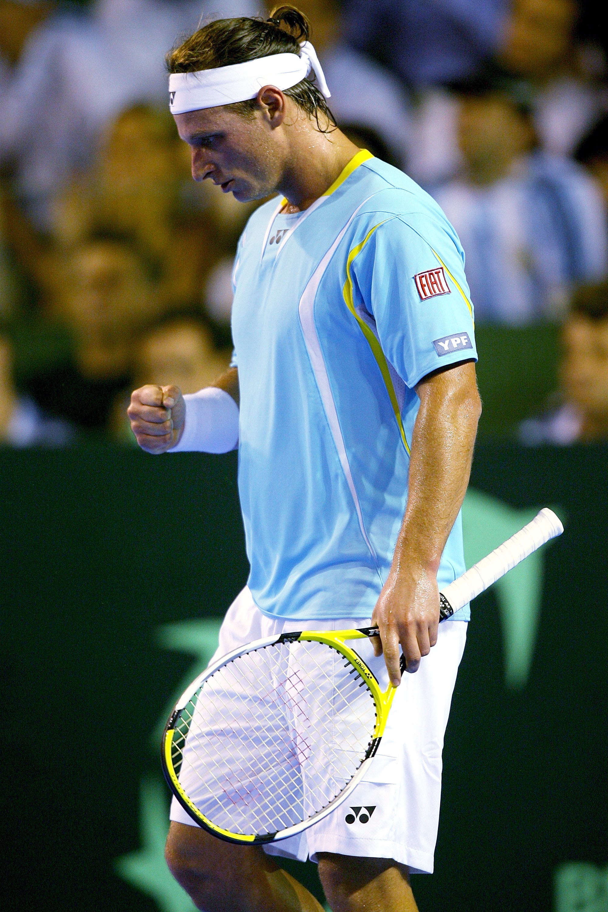 MAR DEL PLATA, ARGENTINA - NOVEMBER 21:  David Nalbandian of Argentina celebrates winning the first set against David Ferrer of Spain during the first rubber of the Davis Cup final at Estadia Islas Malinas November 21, 2008 in Mar del Plata, Argentina.  (