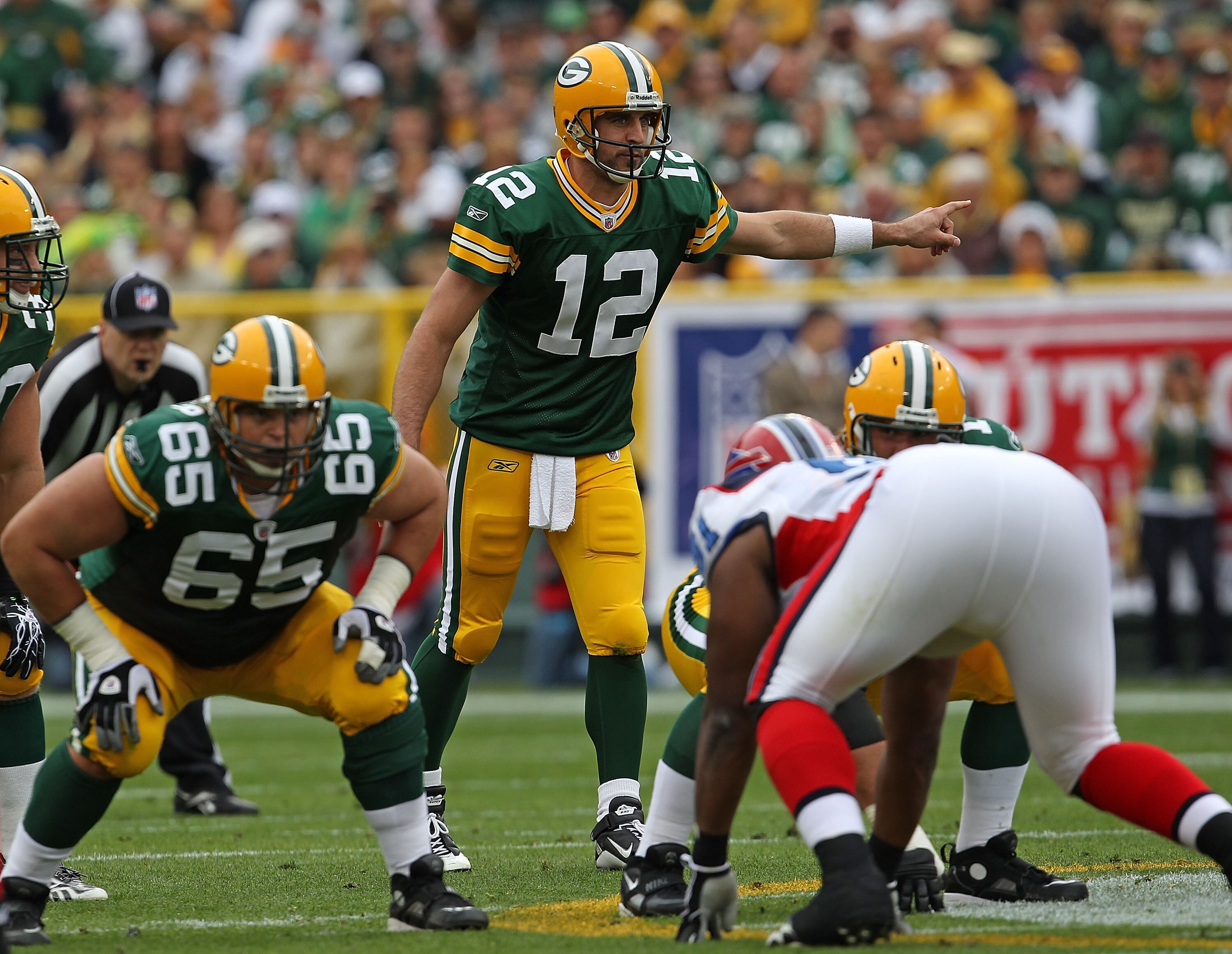 GREEN BAY, WI - SEPTEMBER 19: Aaron Rodgers #12 of the Green Bay Packers calls the signals against the Buffalo Bills at Lambeau Field on September 19, 2010 in Green Bay, Wisconsin. The Packers defeated the Bills 34-7. (Photo by Jonathan Daniel/Getty Image
