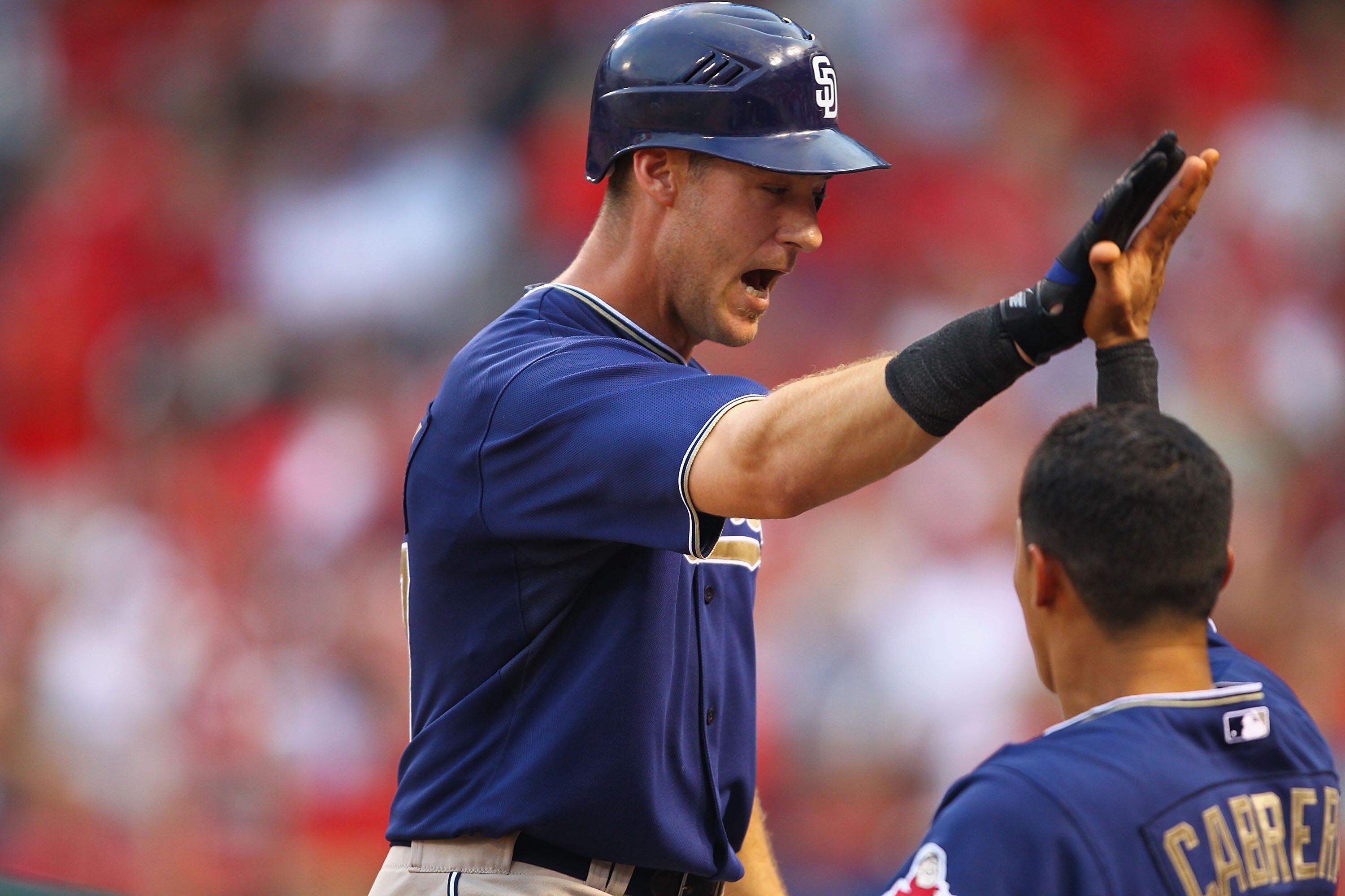 ST. LOUIS - SEPTEMBER 18: Ryan Ludwick #47 of the San Diego Padres is congratulated after hitting a game-winning three-run home run park against the St. Louis Cardinals at Busch Stadium on September 18, 2010 in St. Louis, Missouri.  The Padres beat the Ca