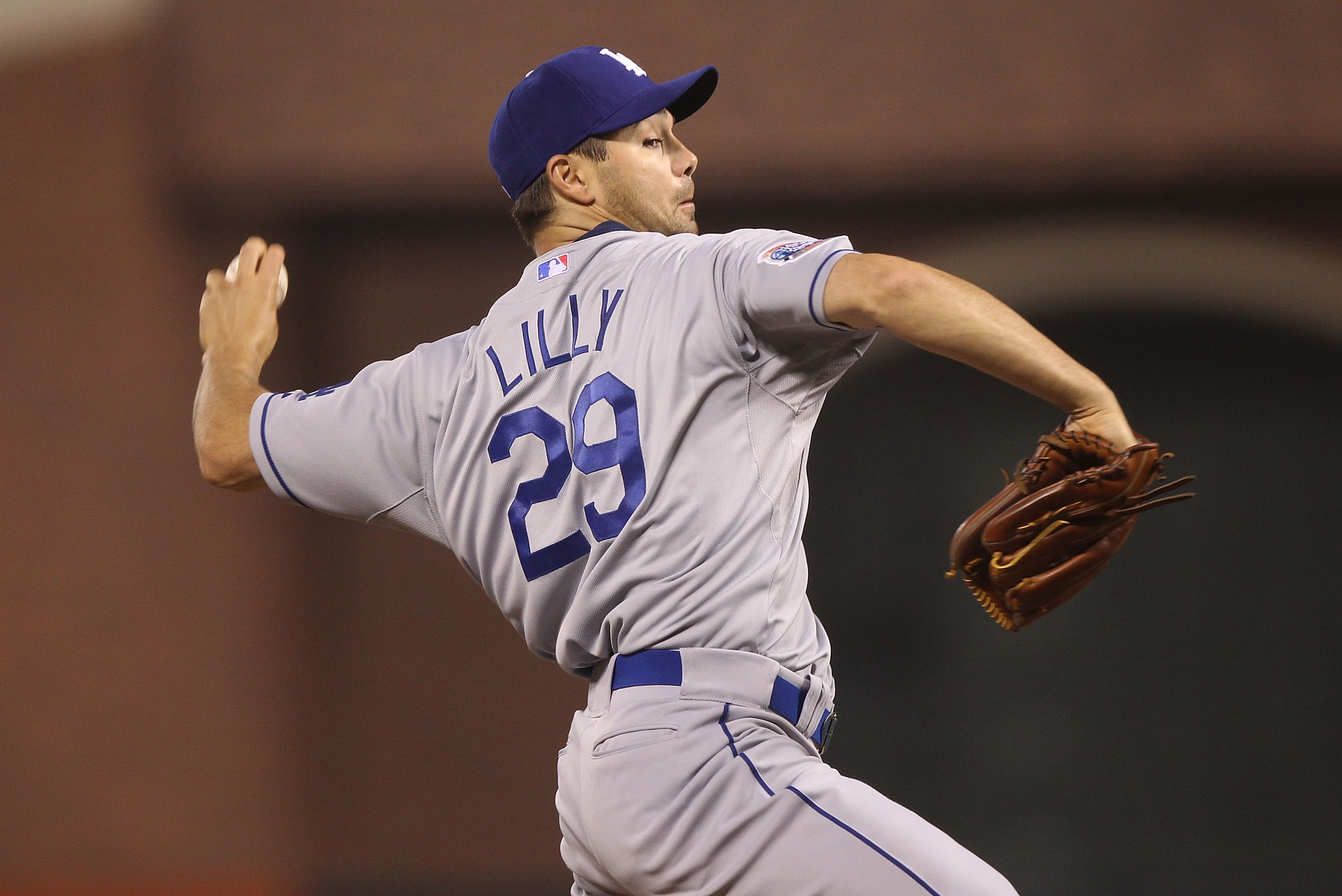 SAN FRANCISCO - SEPTEMBER 16:  Ted Lilly #29 of the Los Angeles Dodgers pitches against the San Francisco Giants during a Major League Baseball game at AT&T Park on September 16, 2010 in San Francisco, California. (Photo by Jed Jacobsohn/Getty Images)