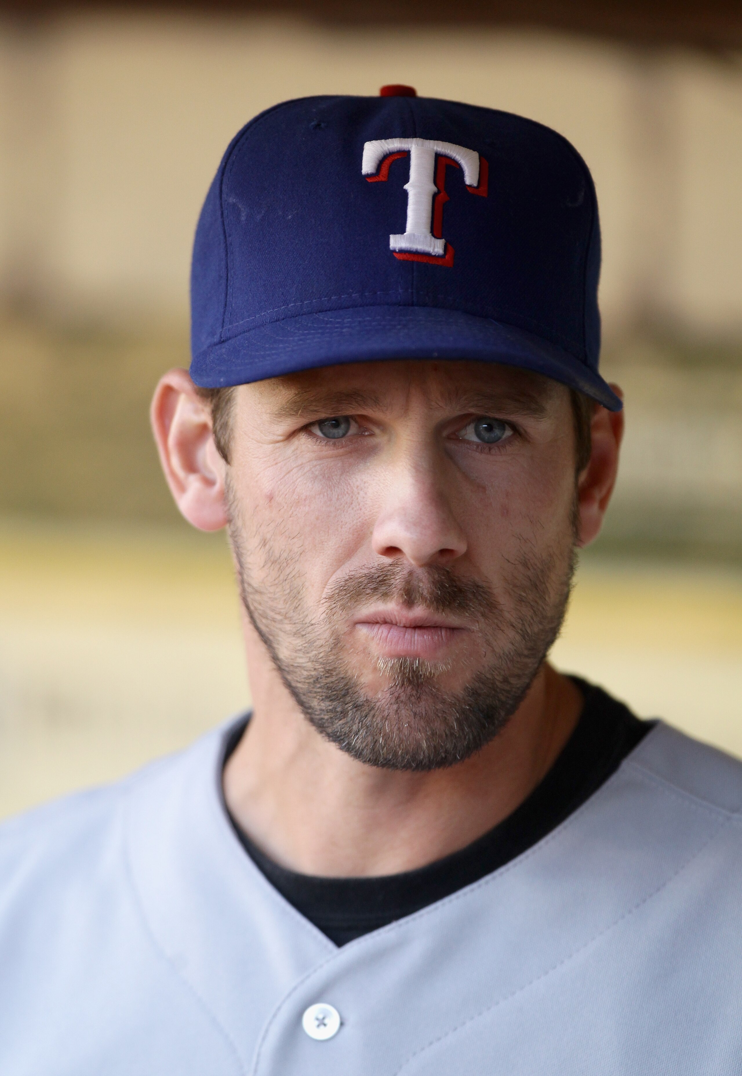 OAKLAND, CA - AUGUST 06: Cliff Lee #33 of the Texas Rangers stands in the dugout before their game against the Oakland Athletics at the Oakland-Alameda County Coliseum on August 6, 2010 in Oakland, California. (Photo by Ezra Shaw/Getty Images) OAKLAND, CA - AUGUST 06: Cliff Lee #33 of the Texas Rangers stands in the dugout before their game against the Oakland Athletics at the Oakland-Alameda County Coliseum on August 6, 2010 in Oakland, California. (Photo by Ezra Shaw/Getty Images)