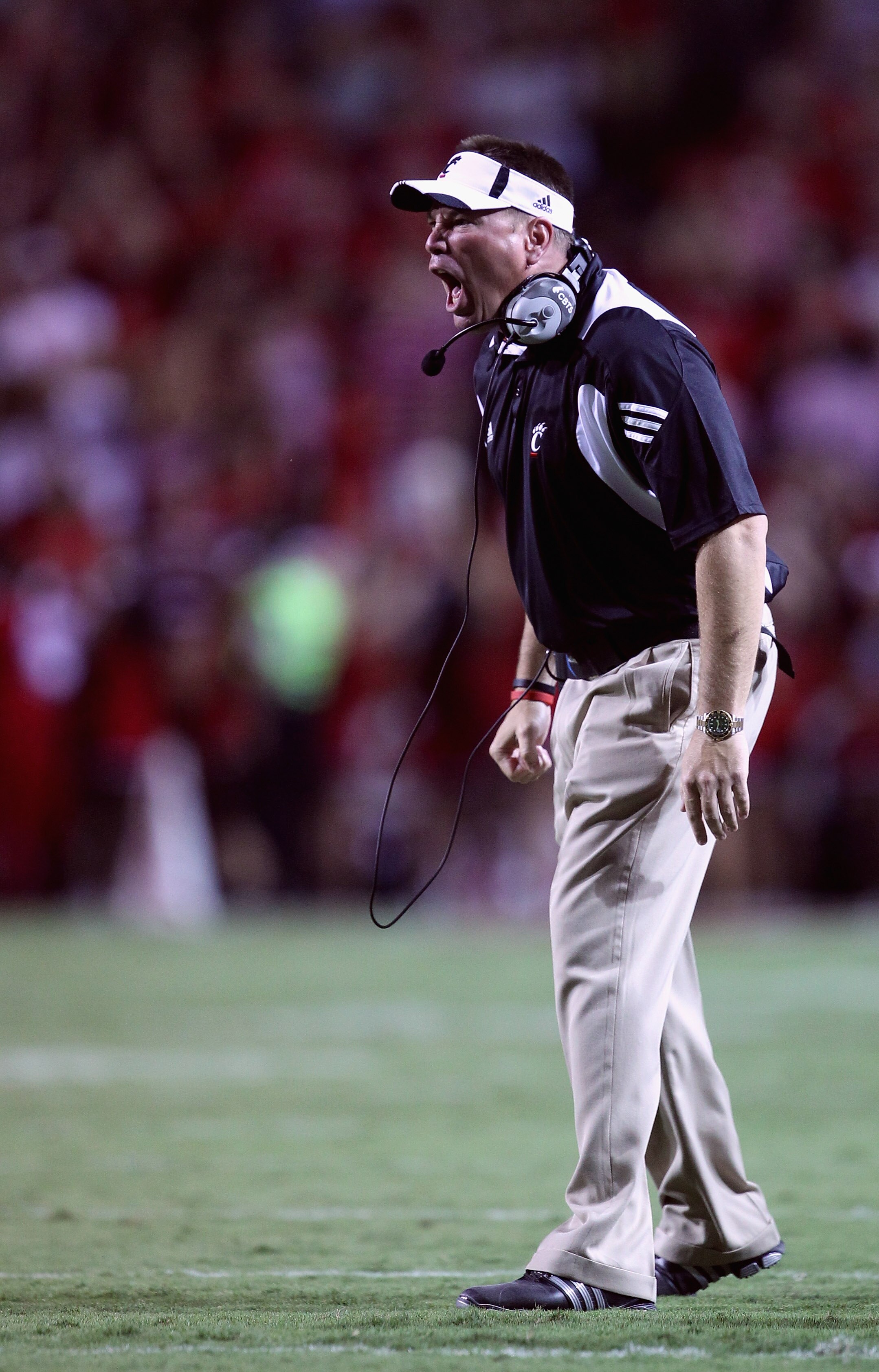 RALEIGH, NC - SEPTEMBER 16:  Head coach Butch Jones of the Cincinnati Bearcats yells at his team against the North Carolina State Wolfpack during their game at Carter-Finley Stadium on September 16, 2010 in Raleigh, North Carolina.  (Photo by Streeter Lec